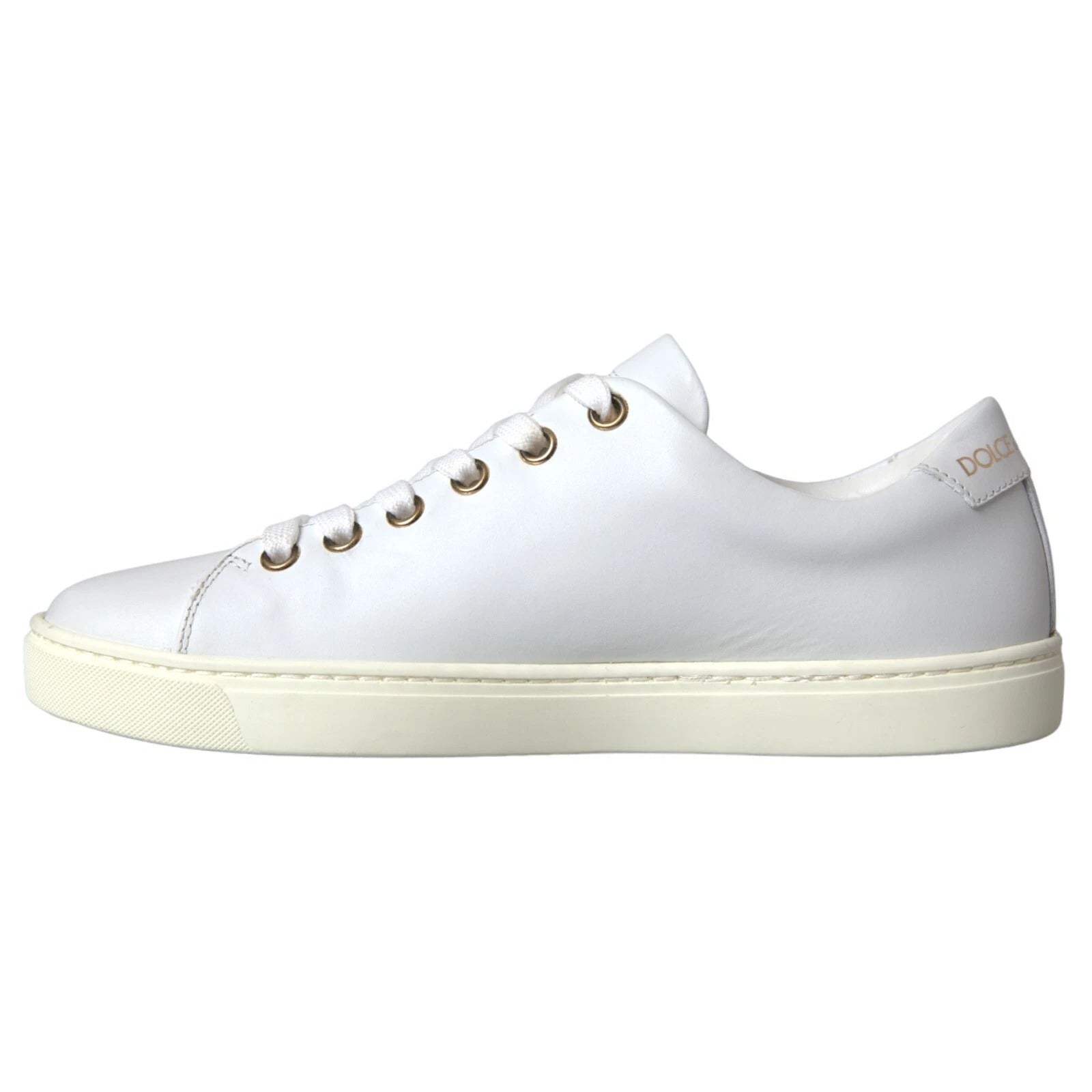 White sneaker with gold laces