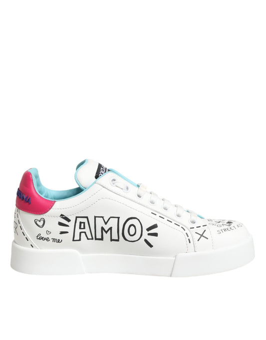 White sneaker with pink and blue accents, featuring handwritten signatures and hearts