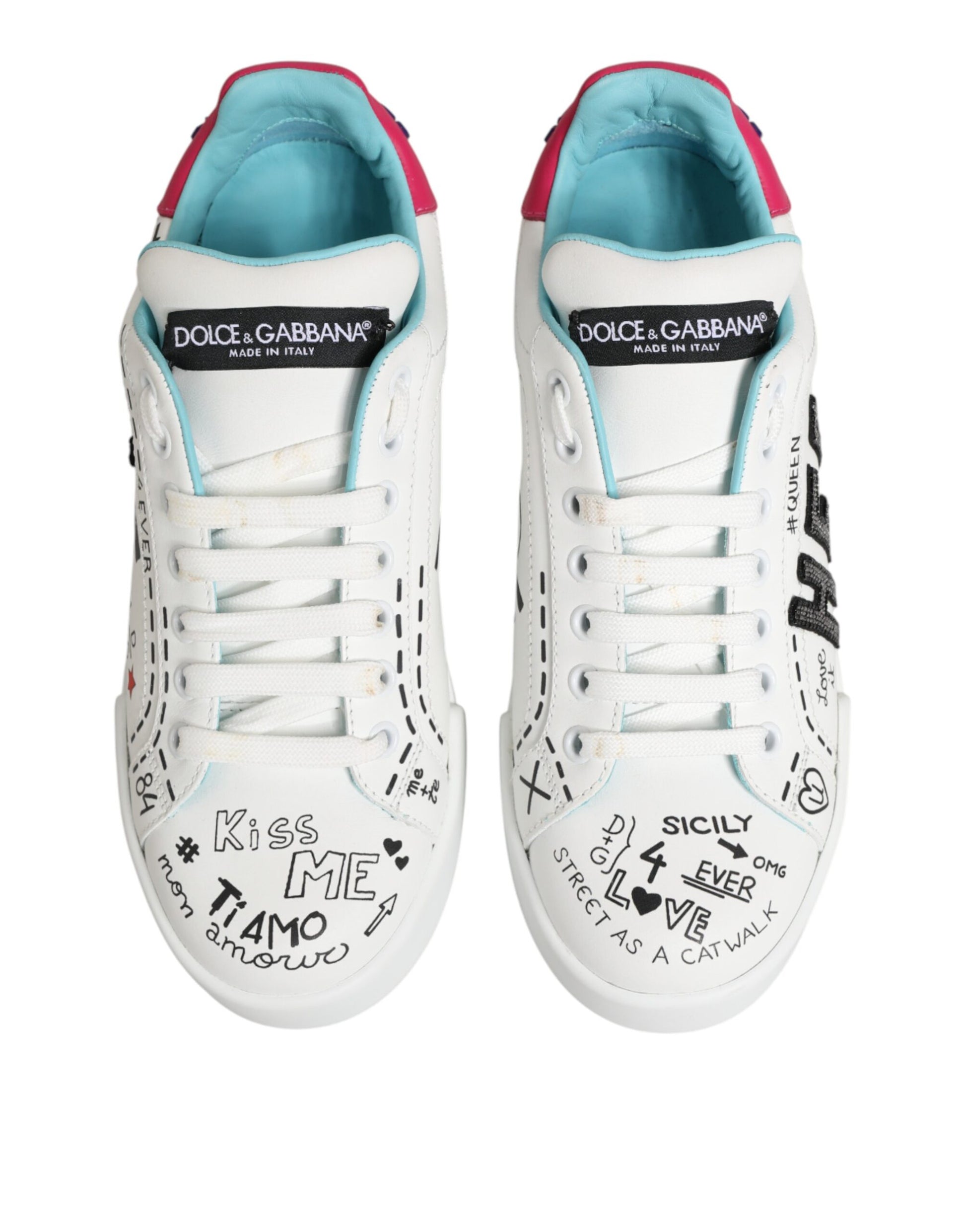 White sneakers with red and blue accents, featuring handwritten messages on the side