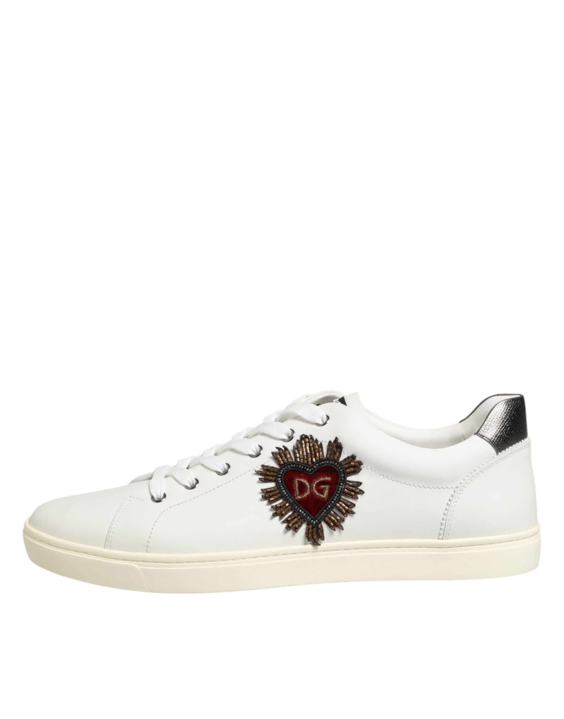 White leather sneakers with heart embellishment on side