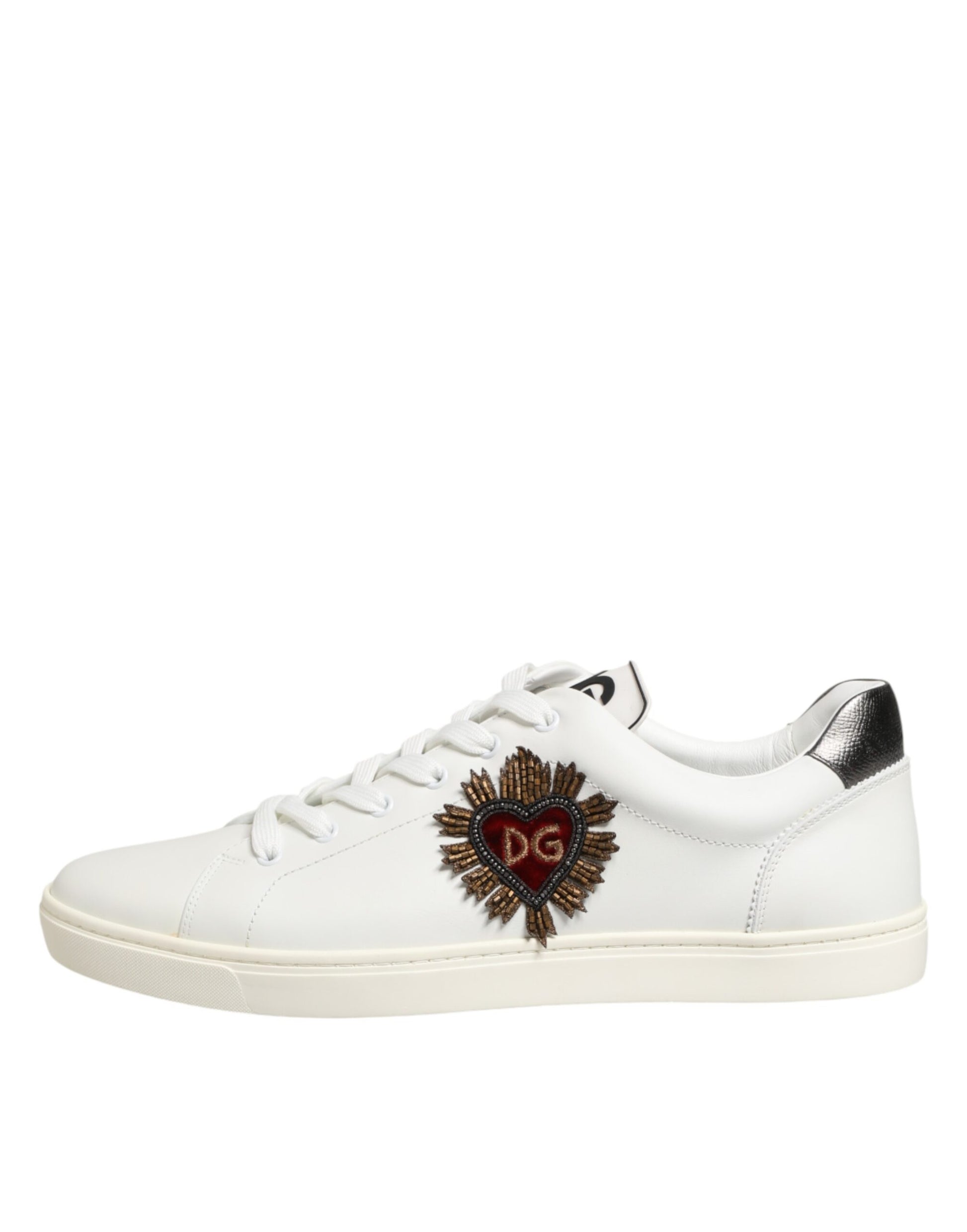 White leather sneakers with heart embellishment on side
