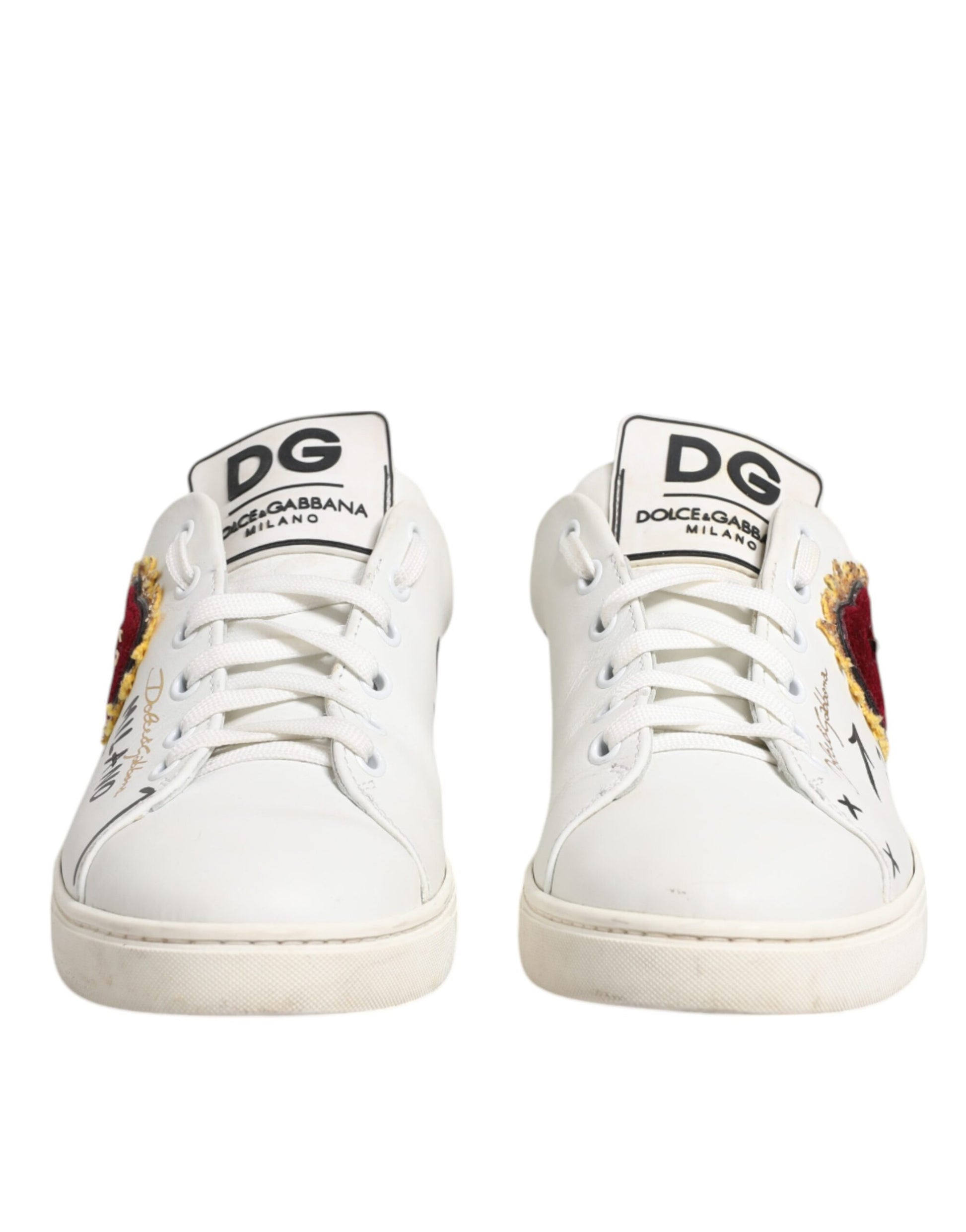 White sneakers with red accents and black laces