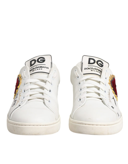 White sneakers with red accents and black laces