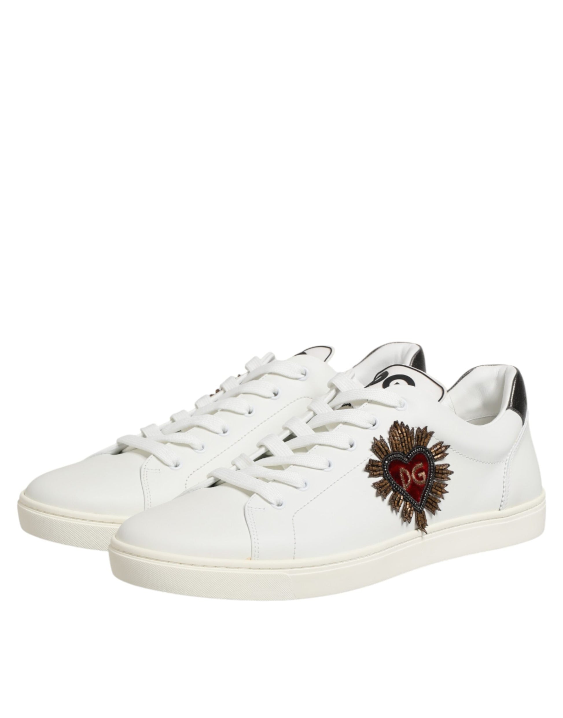 White leather sneakers with heart embellishment on side