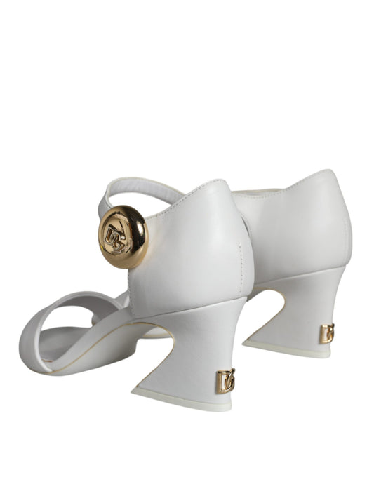 White high heel shoes with gold buckles