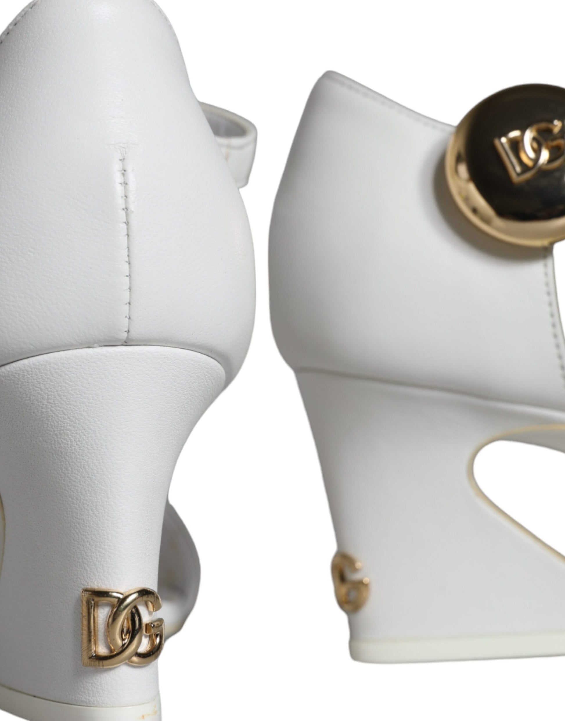 White high heel shoe with gold accents