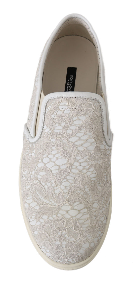 A single shoe against a neutral background. It is a slip-on style with a patterned upper and a flat sole. There are no vi