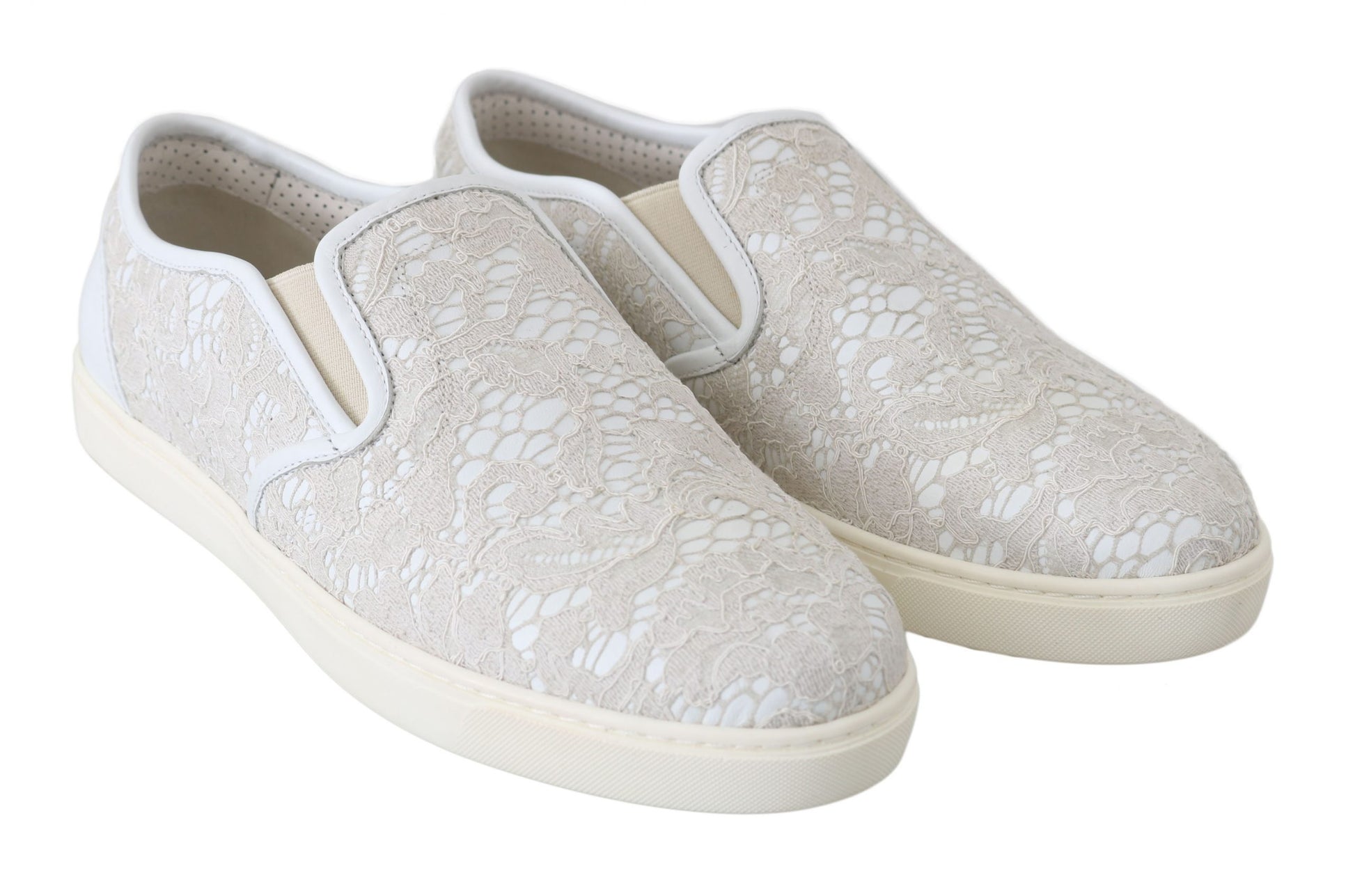 Pair of women's slip on shoes with floral pattern and white soles