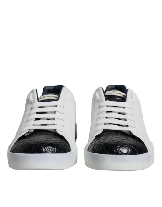 Pair of white sneakers with black laces and a black pattern on the side