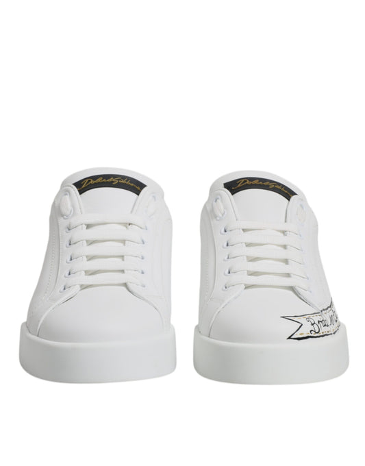 White sneakers with black laces and a small graphic on the side