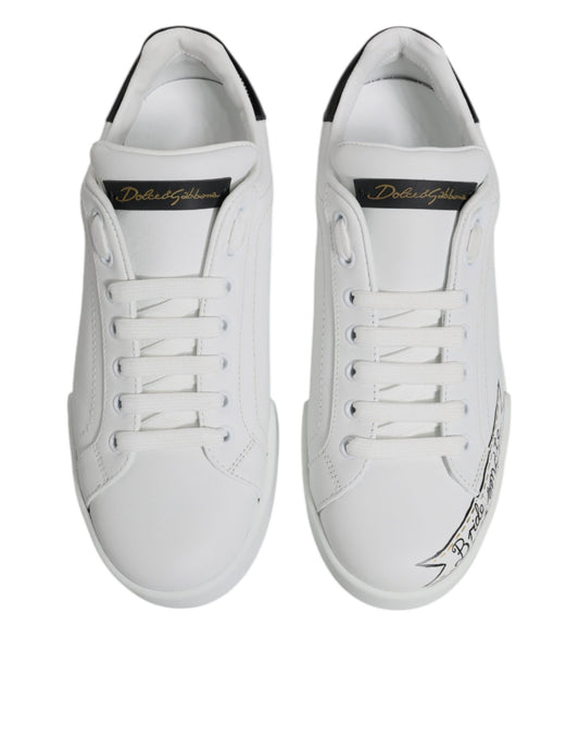 White sneakers with black laces and a logo on the side