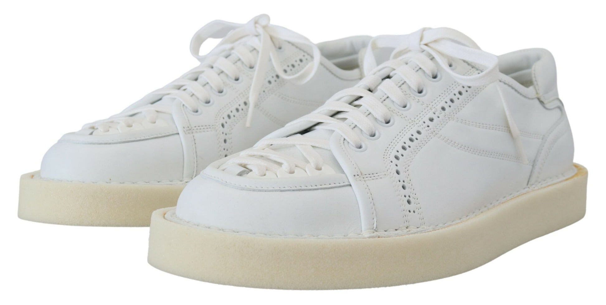 White sneakers with tan soles and white laces