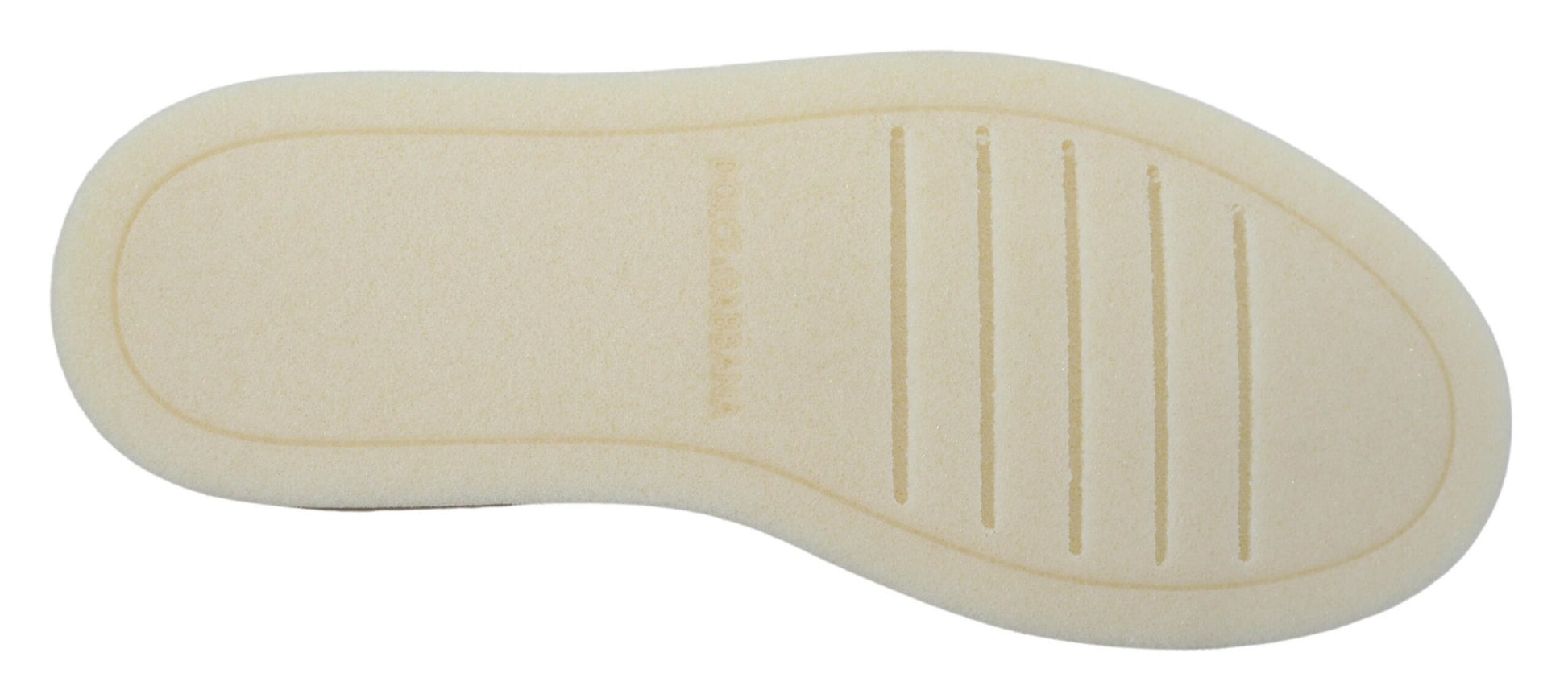 Pair of white sneakers with black soles