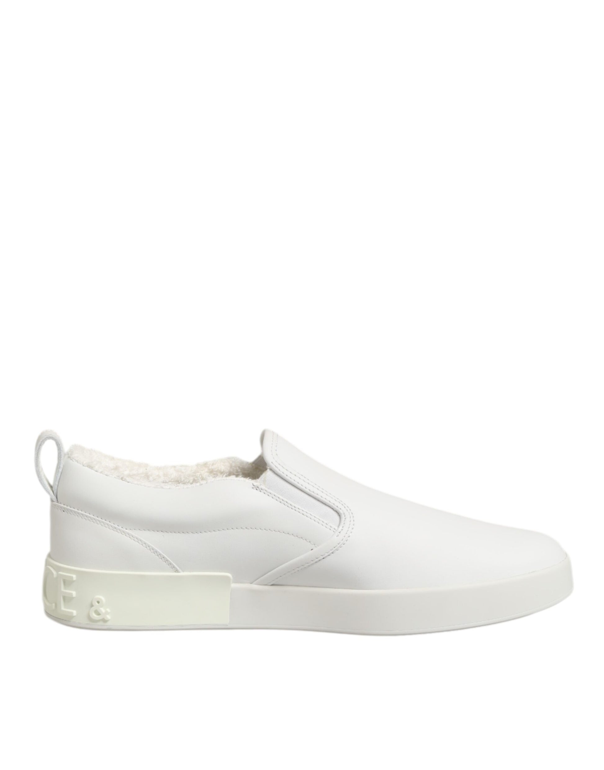 White leather low top slip on shoes with elastic panels and a pull tab