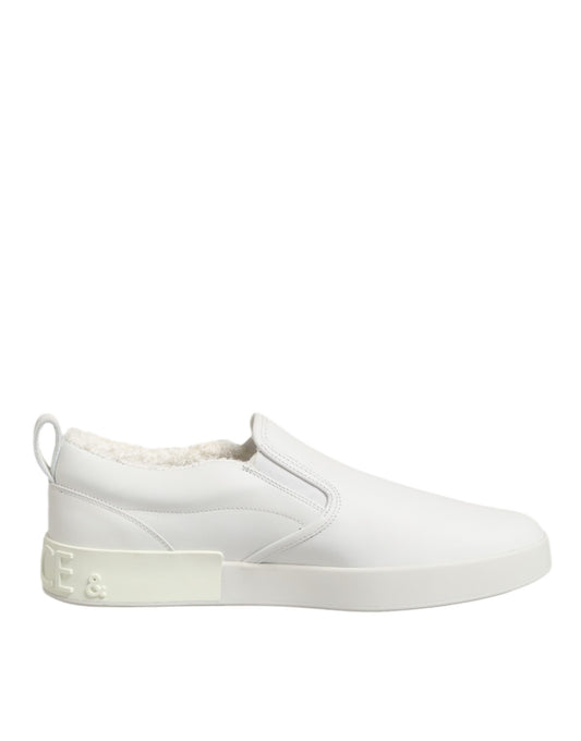 White leather low top slip on shoes with elastic panels and a pull tab