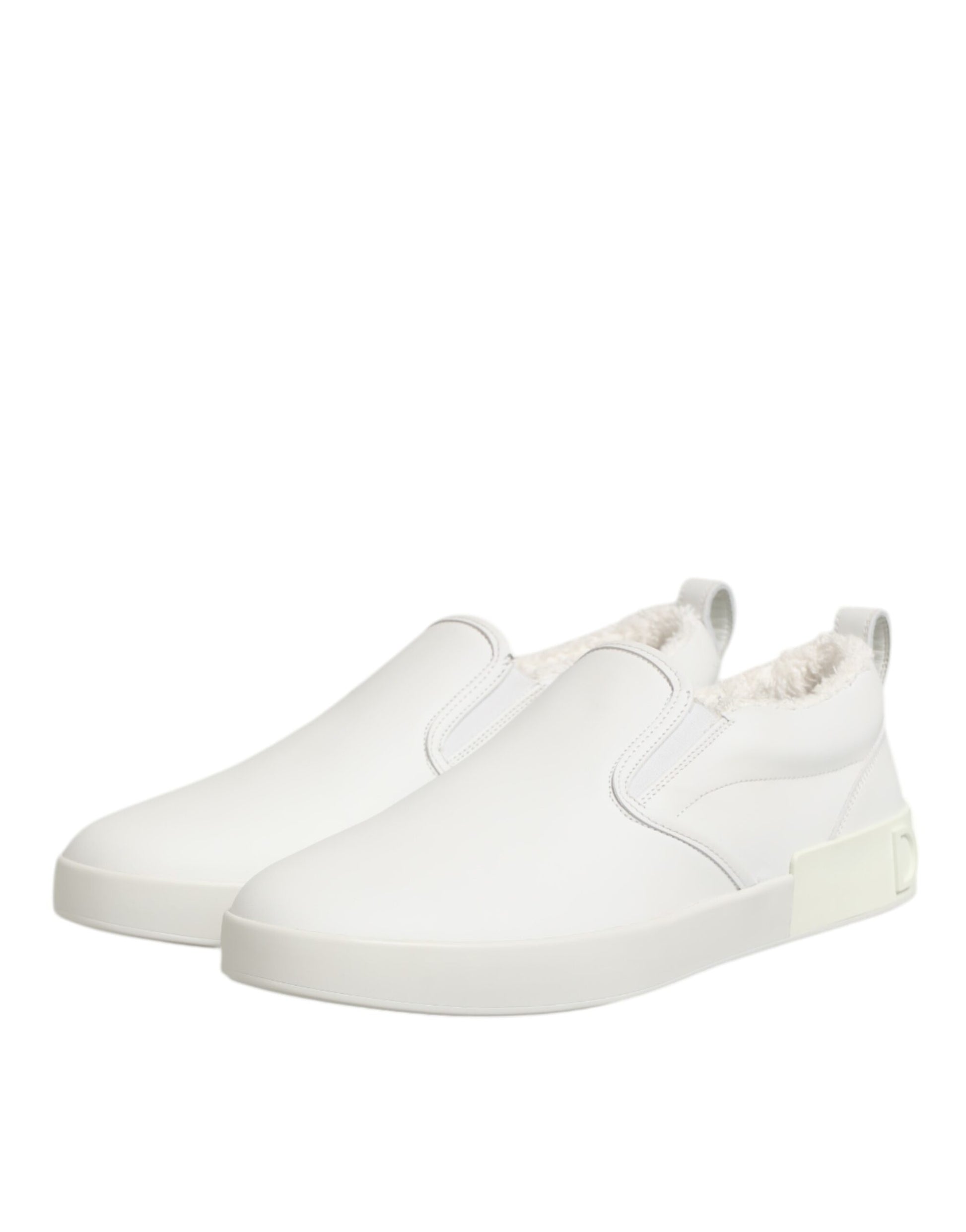 White leather low top slip on shoes with elastic panels and a chunky sole