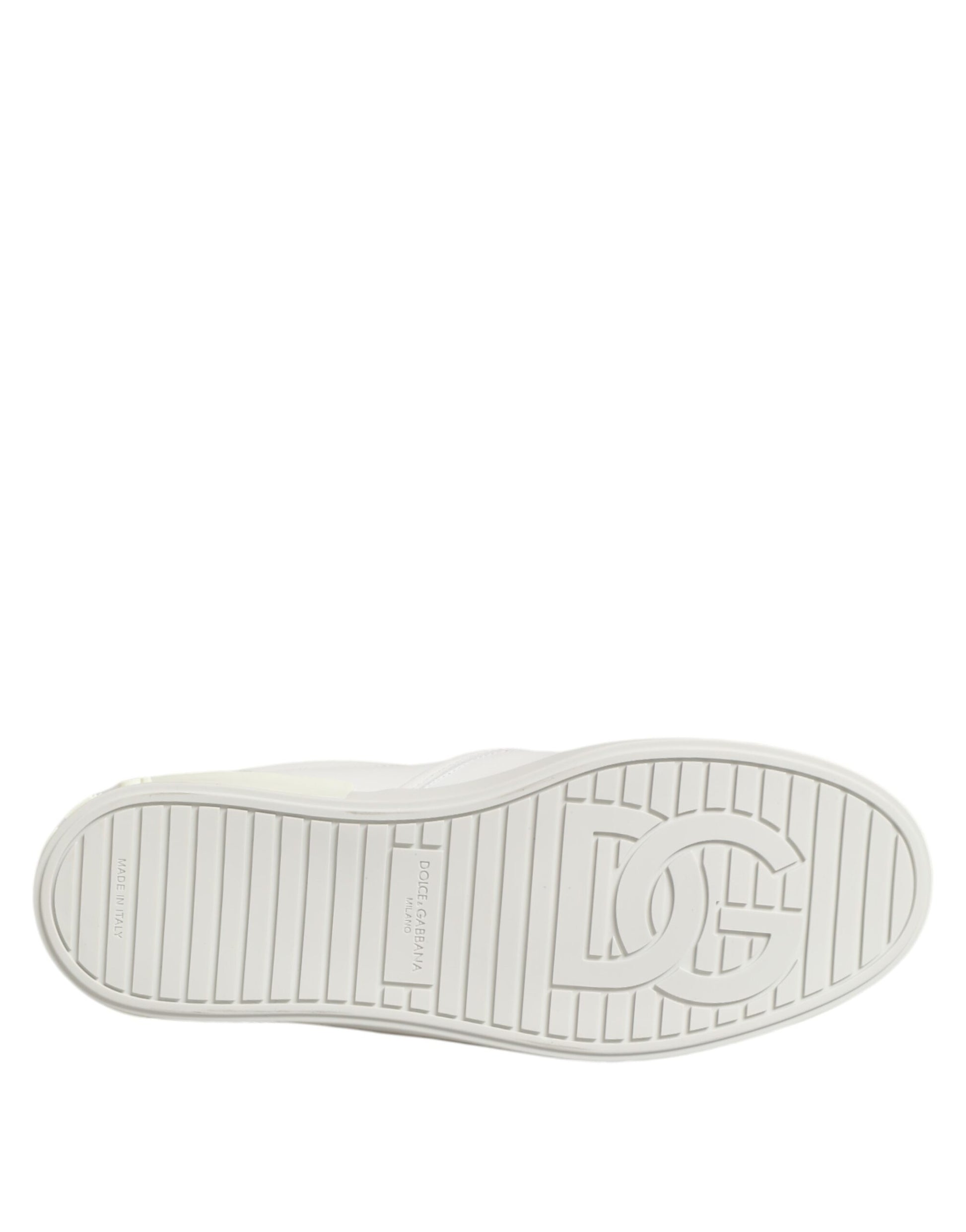 A single white leather slip-on shoe with a low top, featuring the Dolce & Gabbana logo on the side
