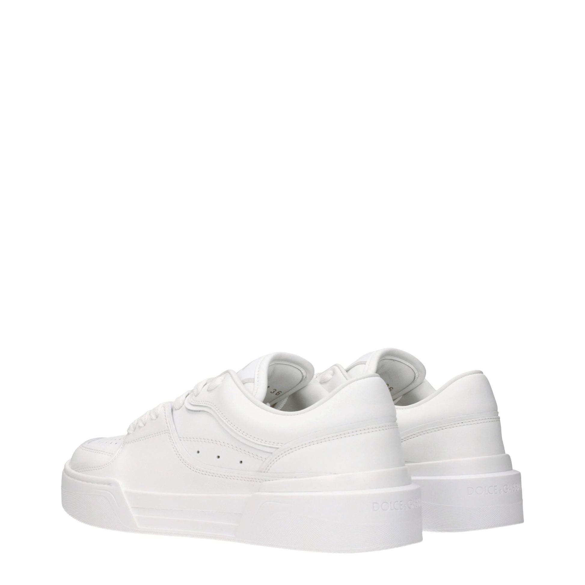 Pair of white leather low top sneakers with laces, brand logo on side and back