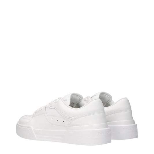Pair of white leather low top sneakers with laces, brand logo on side and back