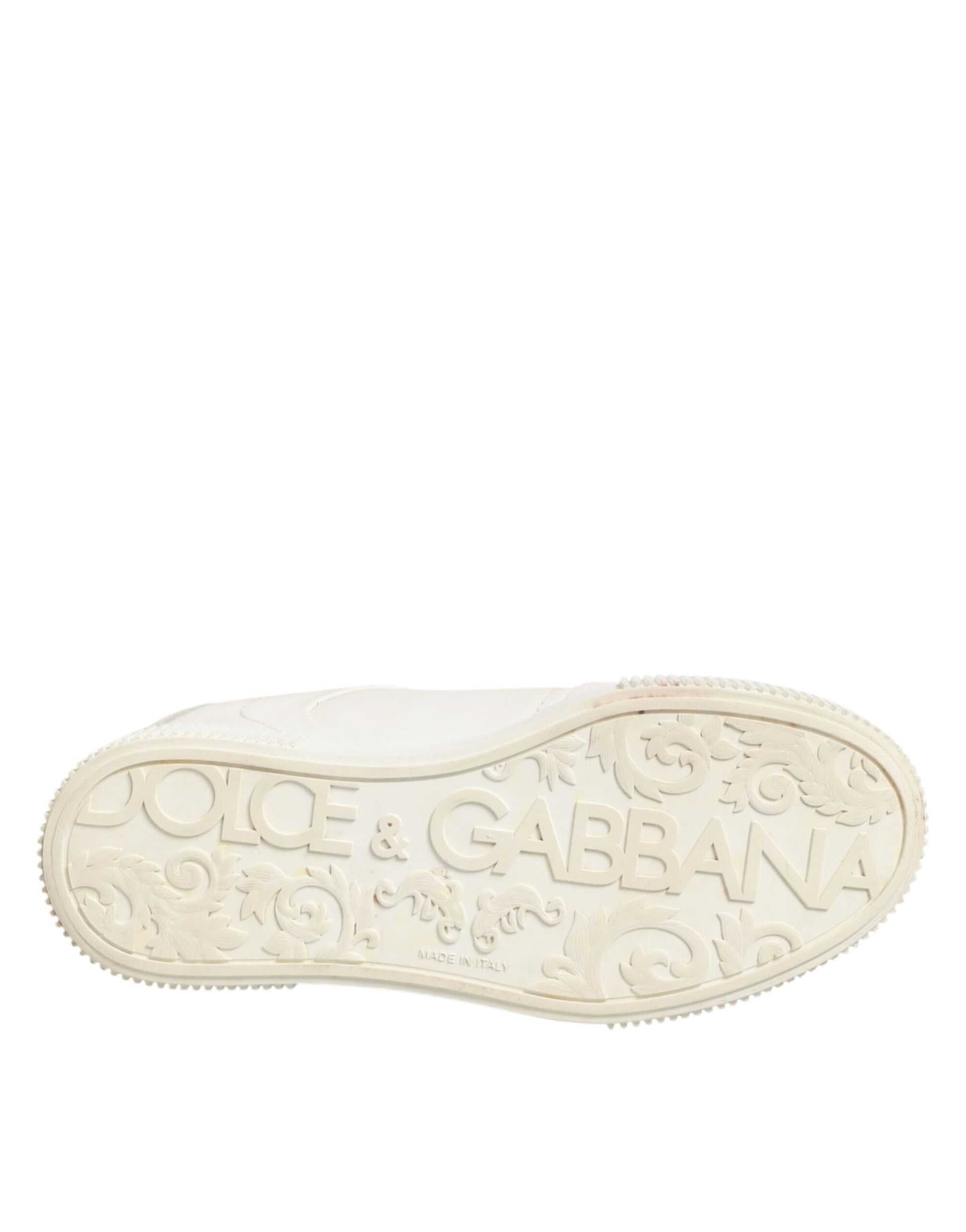 White shoe with black writing on sole