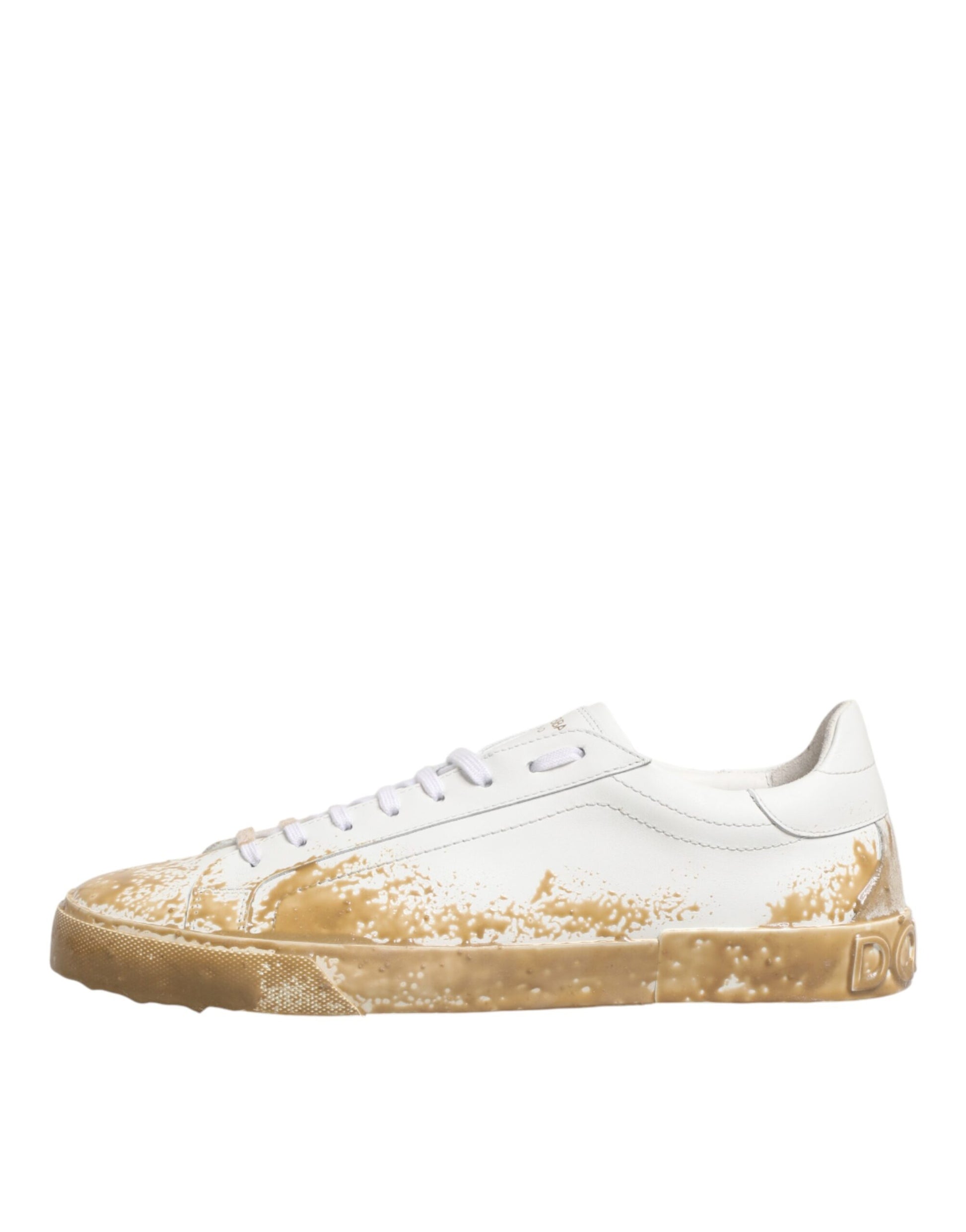 White sneaker with yellow spots on sole