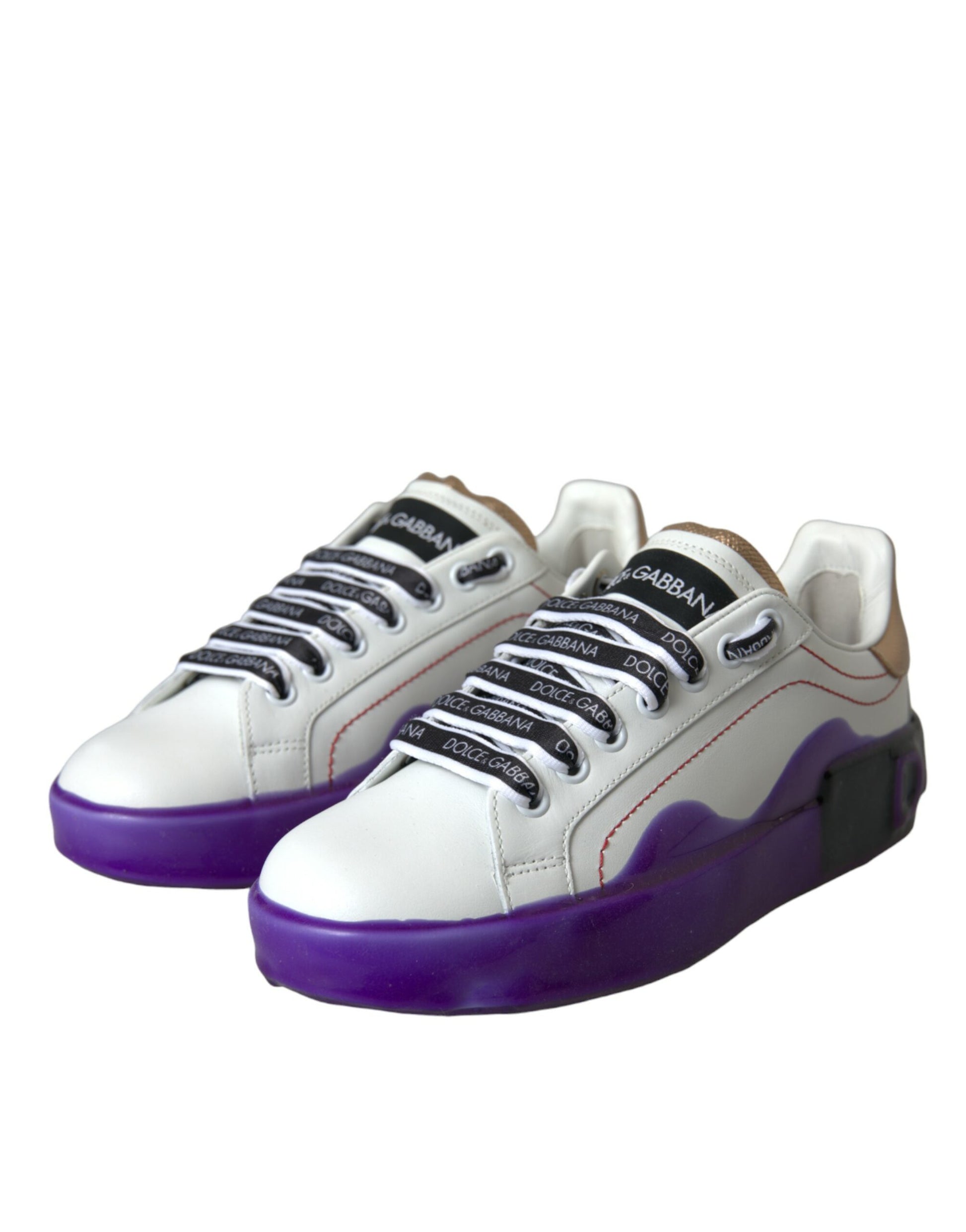Pair of white sneakers with purple accents and black laces