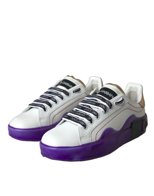 Pair of white sneakers with purple accents and black laces