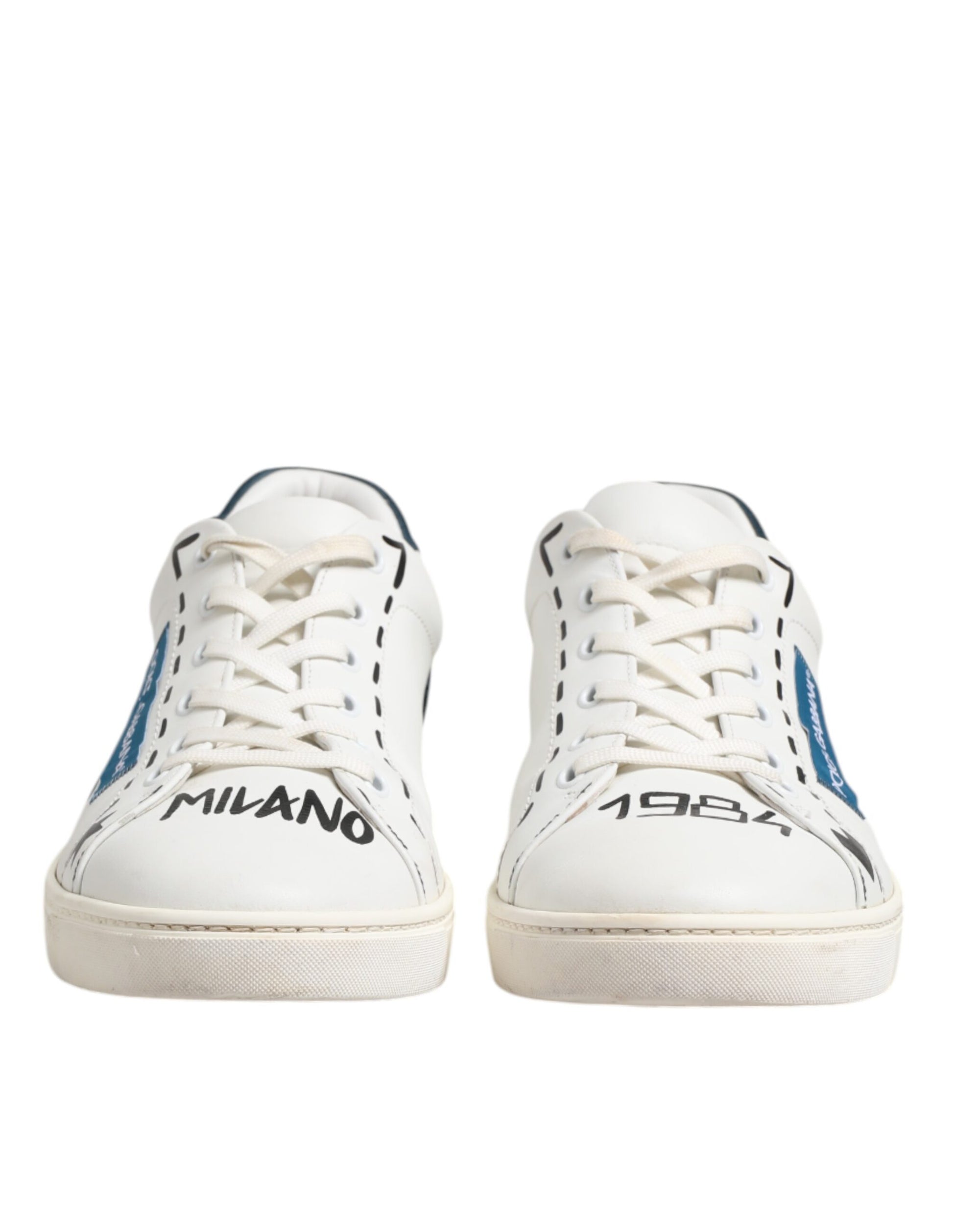Pair of white sneakers with blue accents