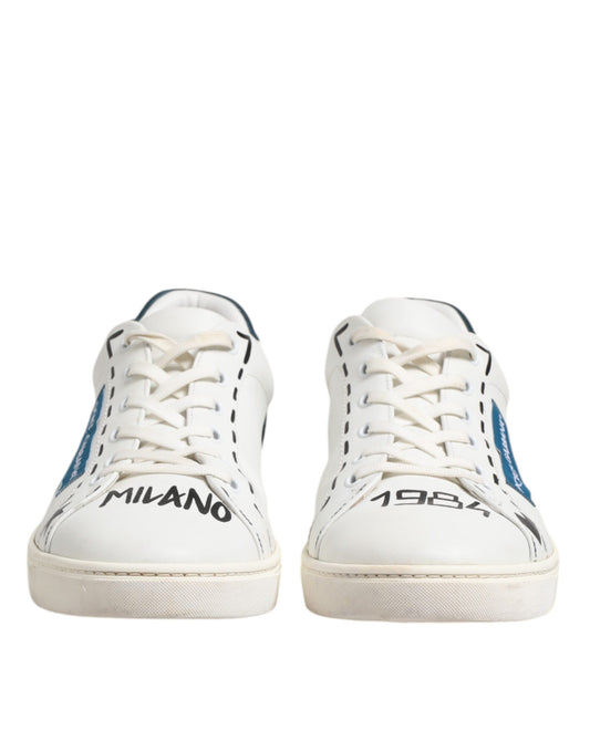 Pair of white sneakers with blue accents