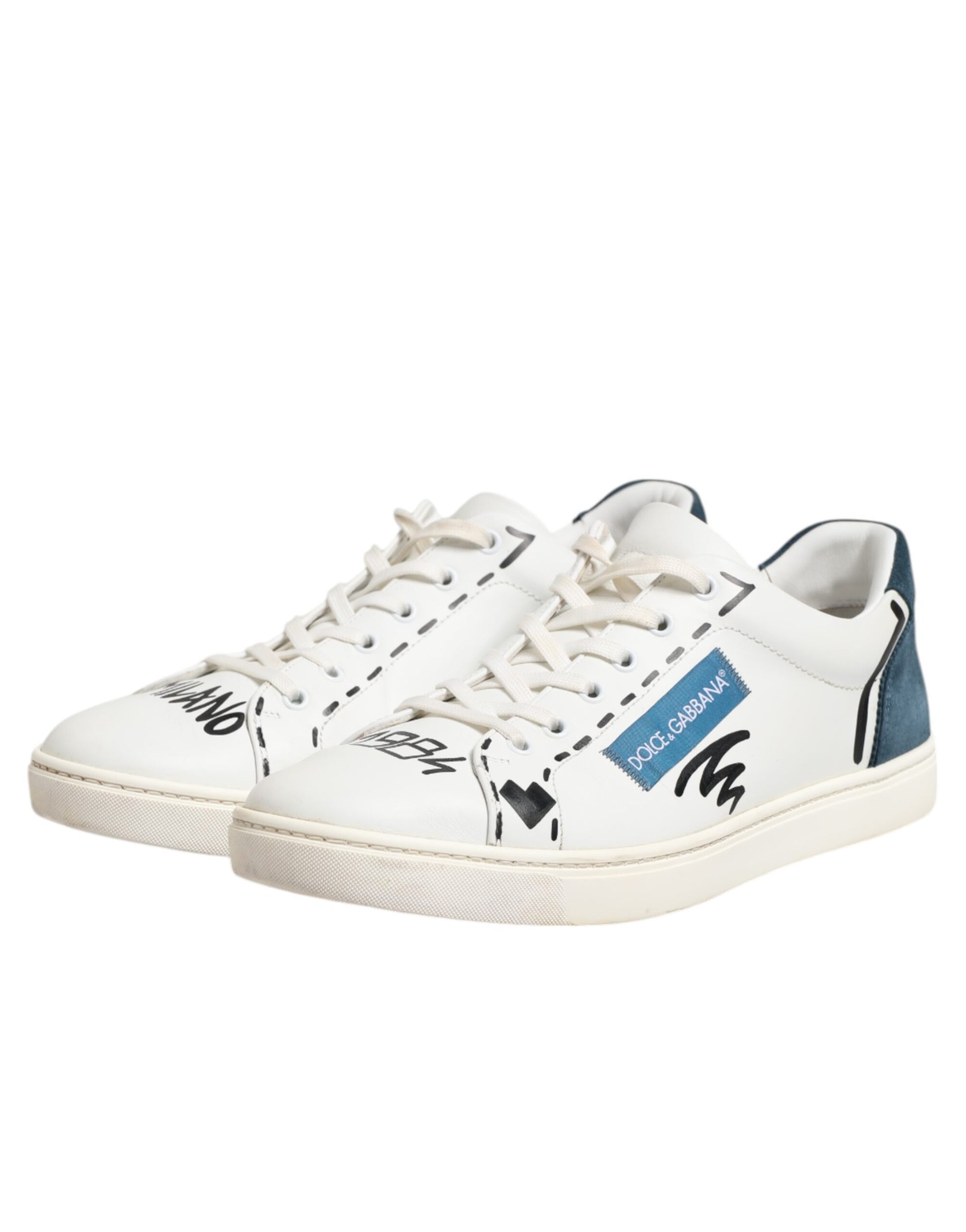 White sneakers with black laces and a blue logo on the side