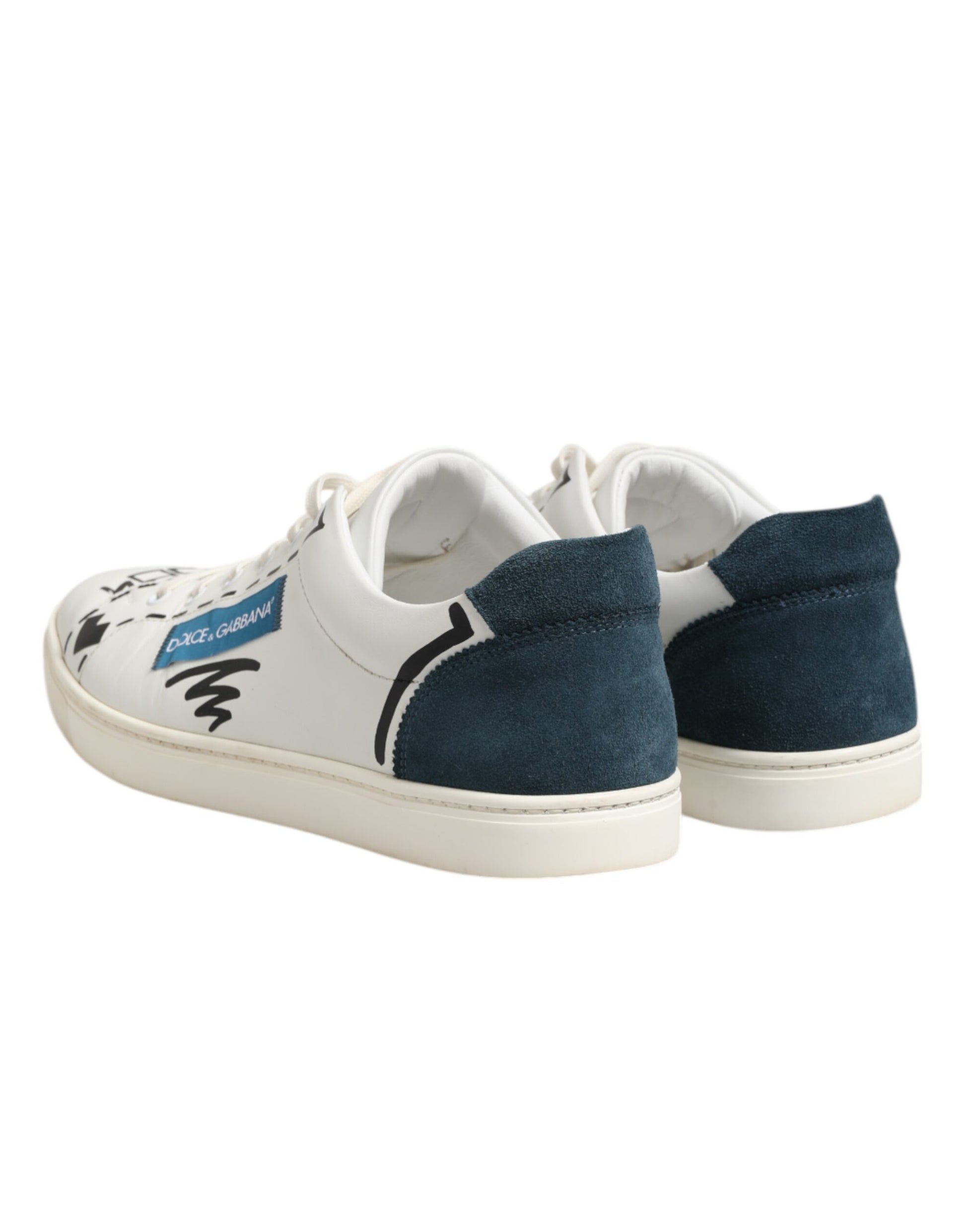 Pair of children's sneakers with laces and velcro straps