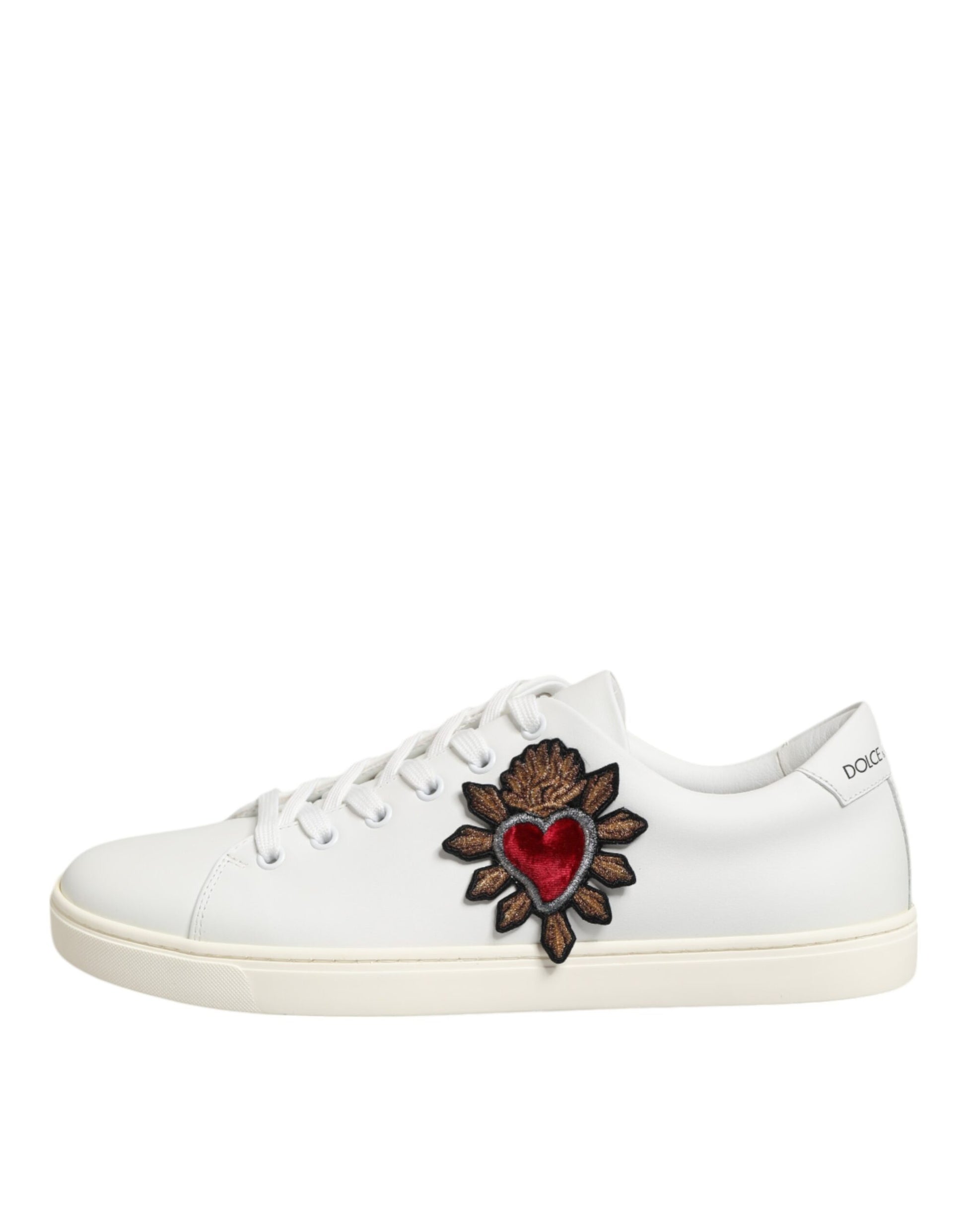 White leather sneakers with heart patch on side, featuring a sacred heart design