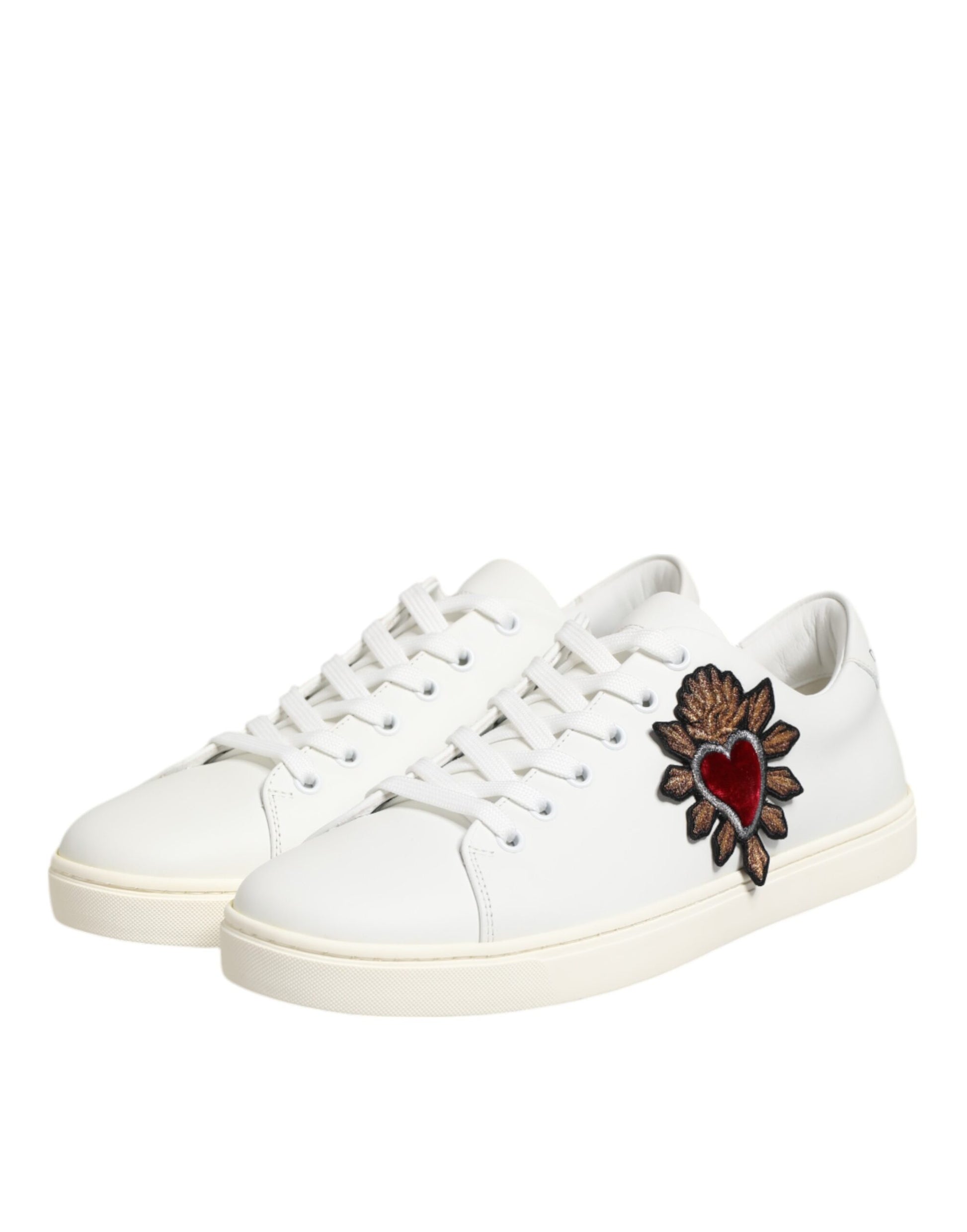 White leather sneakers with heart patch on side