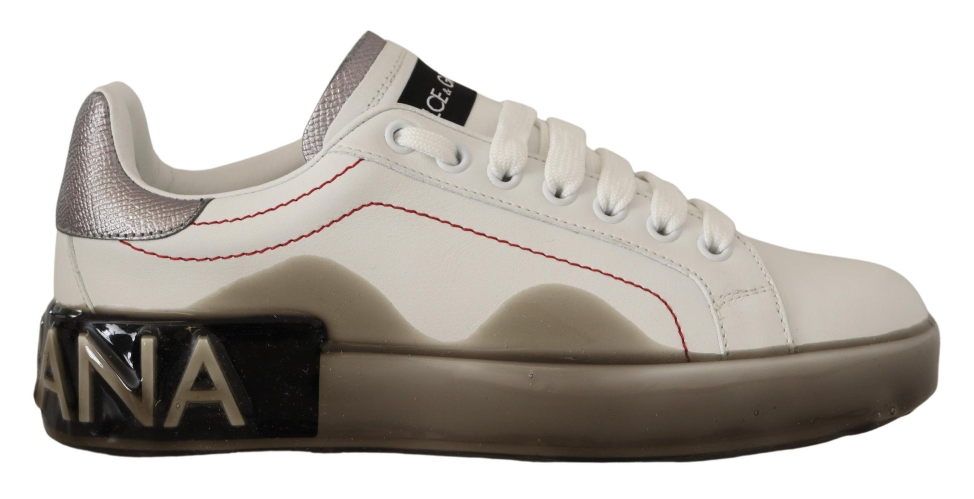 White sneaker with red accents and a logo on the side