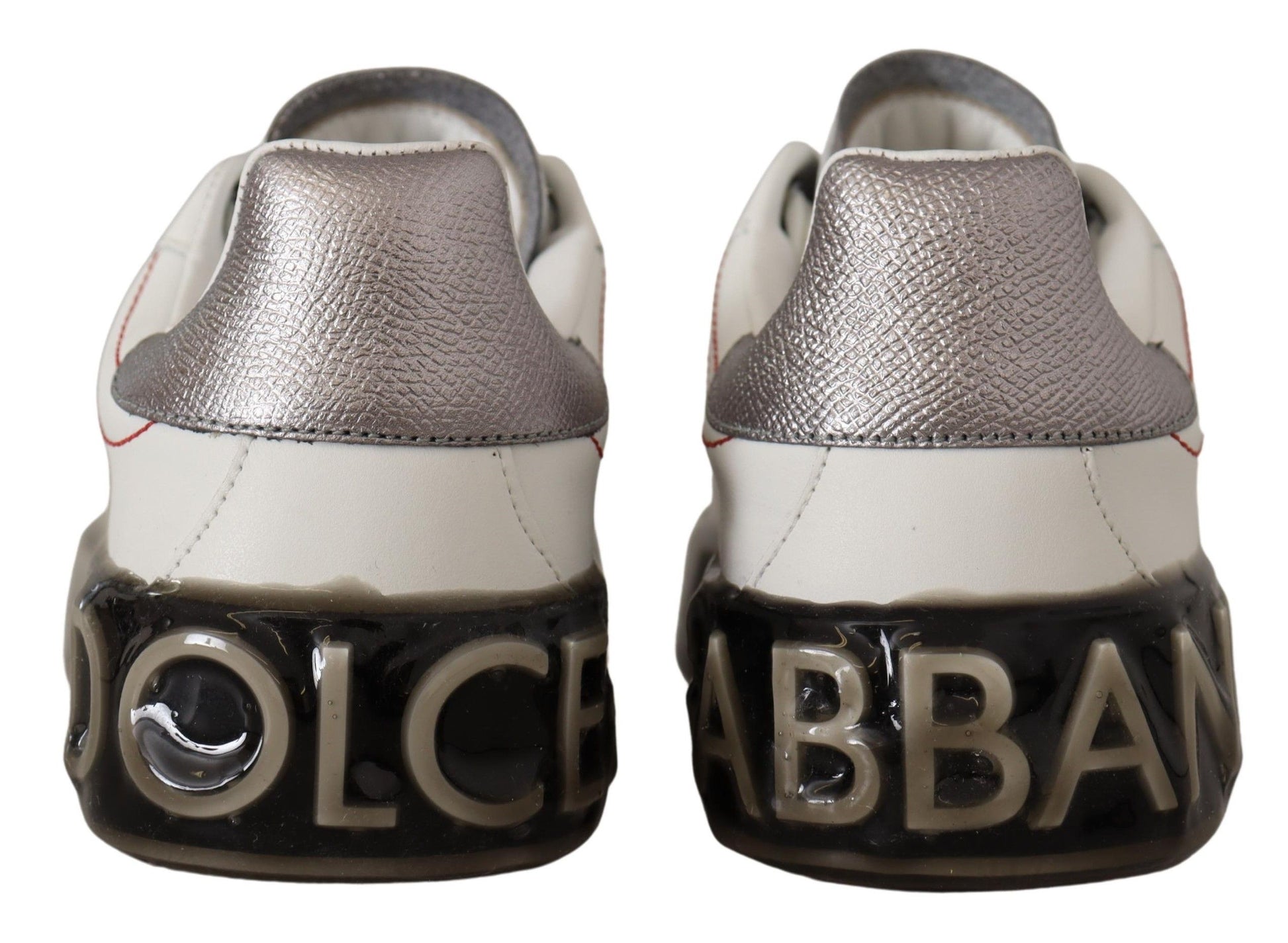 Pair of sneakers with embossed logo on side