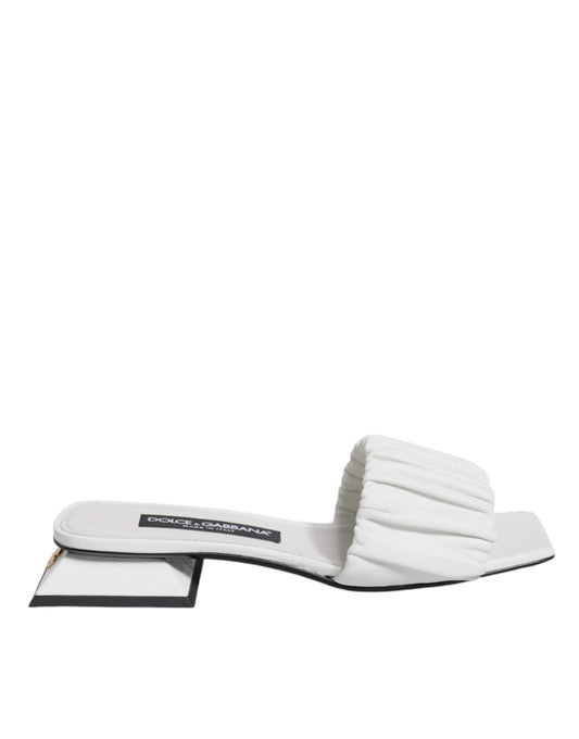 White flip flops on a white surface