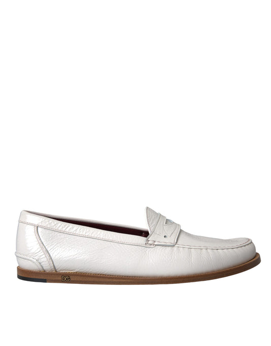 White loafer shoe with brown sole