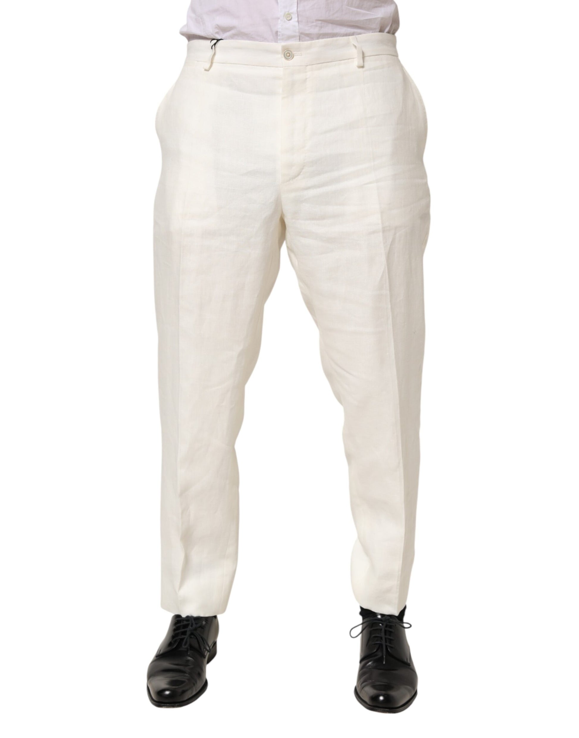 A pair of men's trousers in a light beige color. They appear to be made from linen and have a classic design
