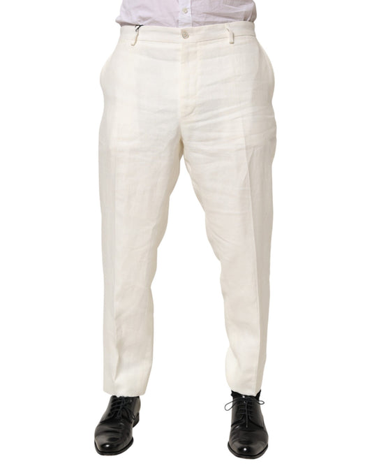 A pair of men's trousers in a light beige color. They appear to be made from linen and have a classic design