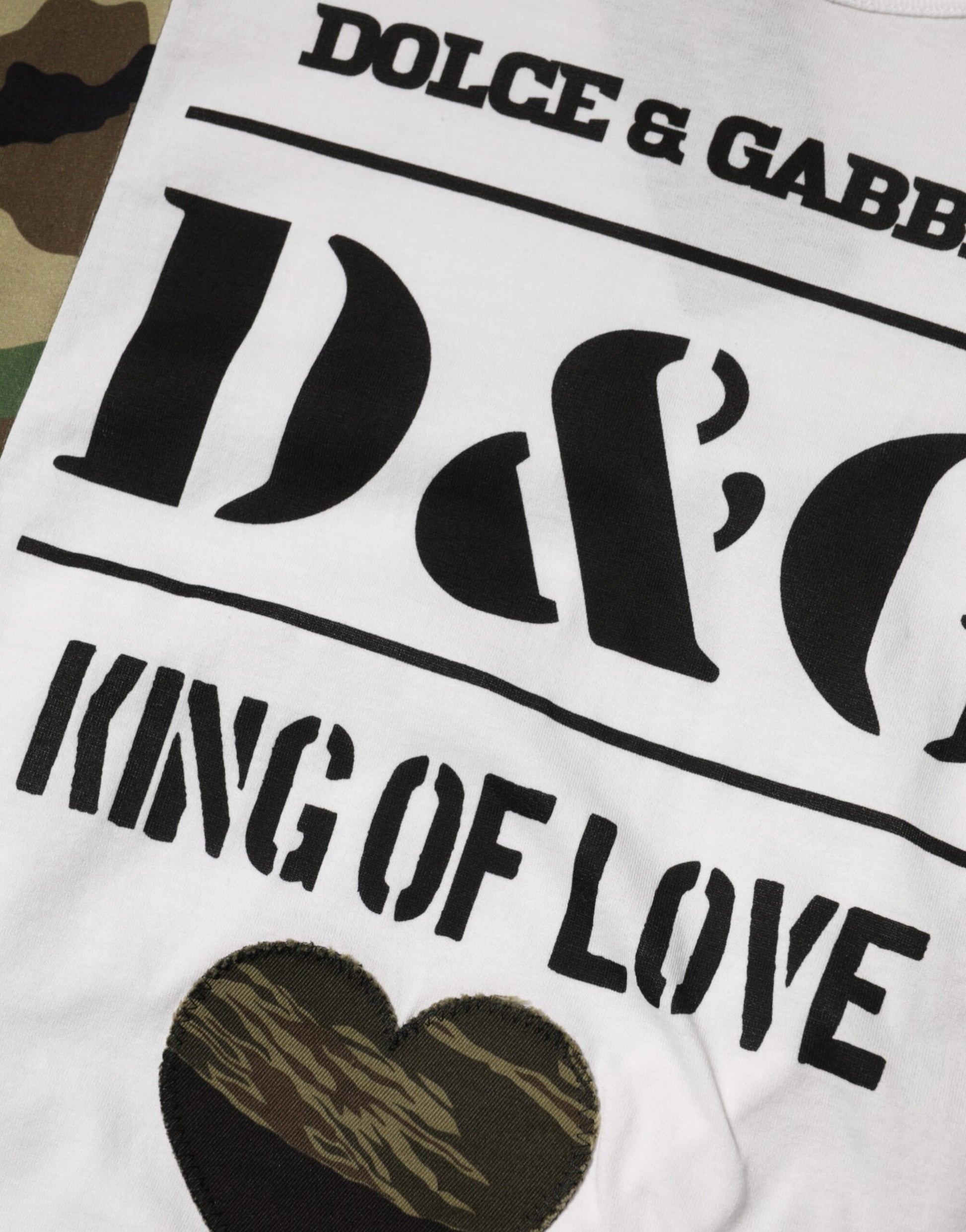 White t-shirt with black lettering and graphic design