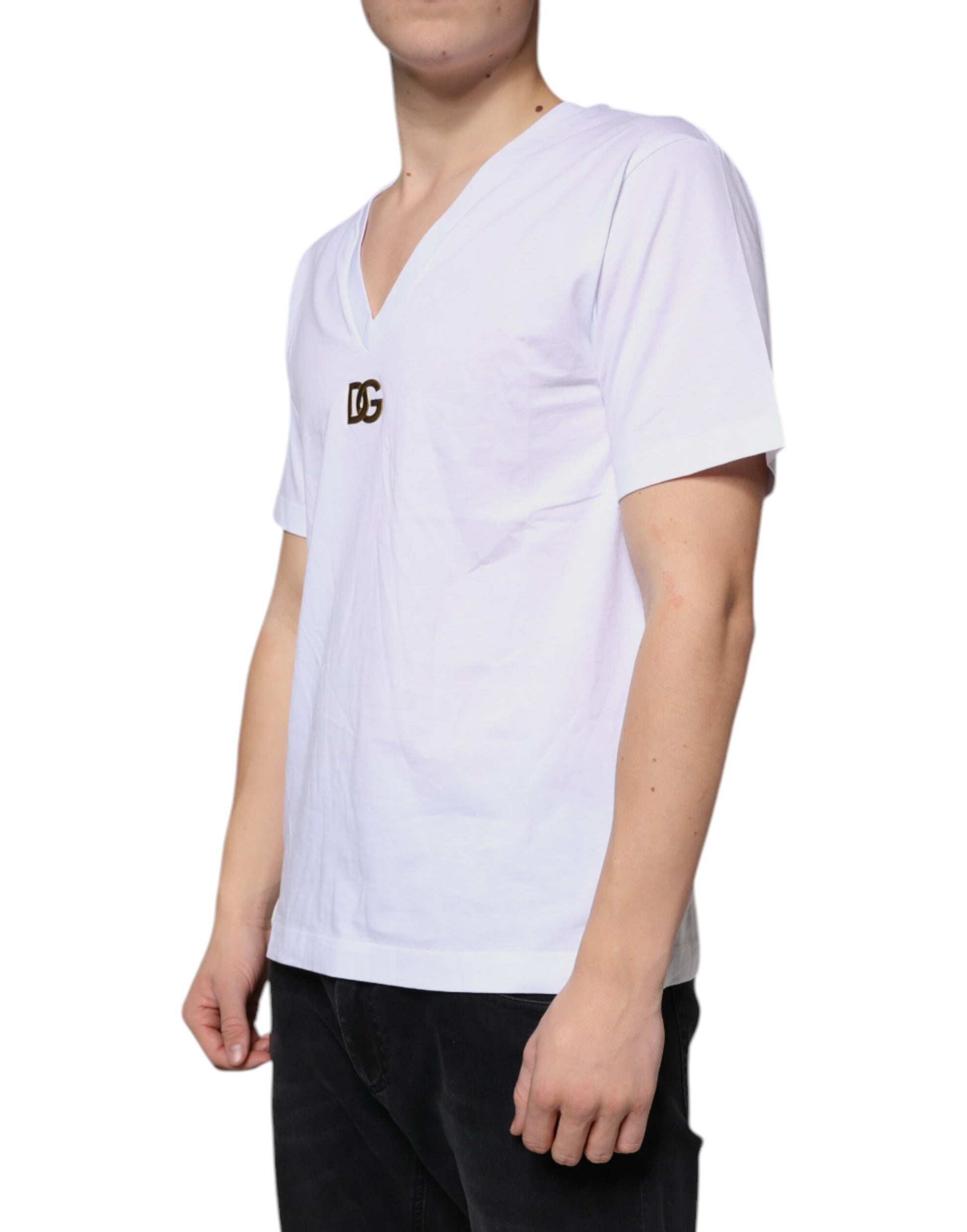 Man wearing white t-shirt with gold logo