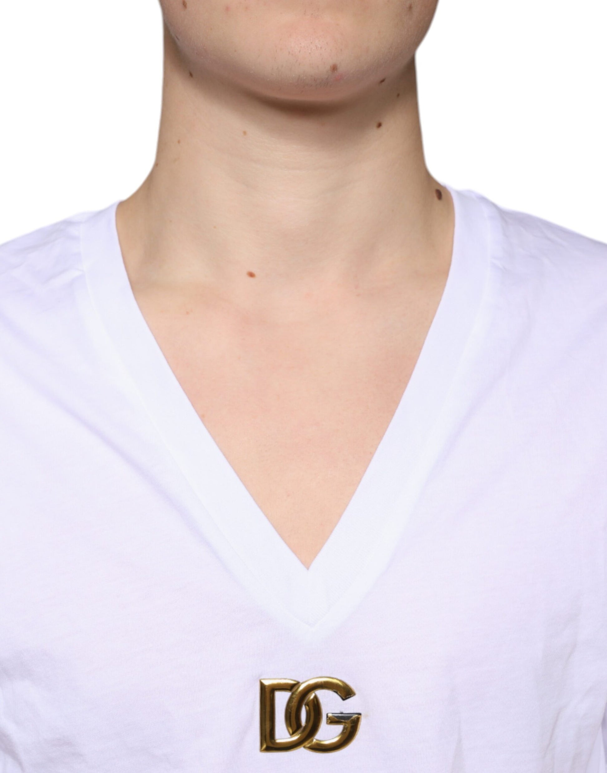 White v neck t-shirt with gold logo on chest