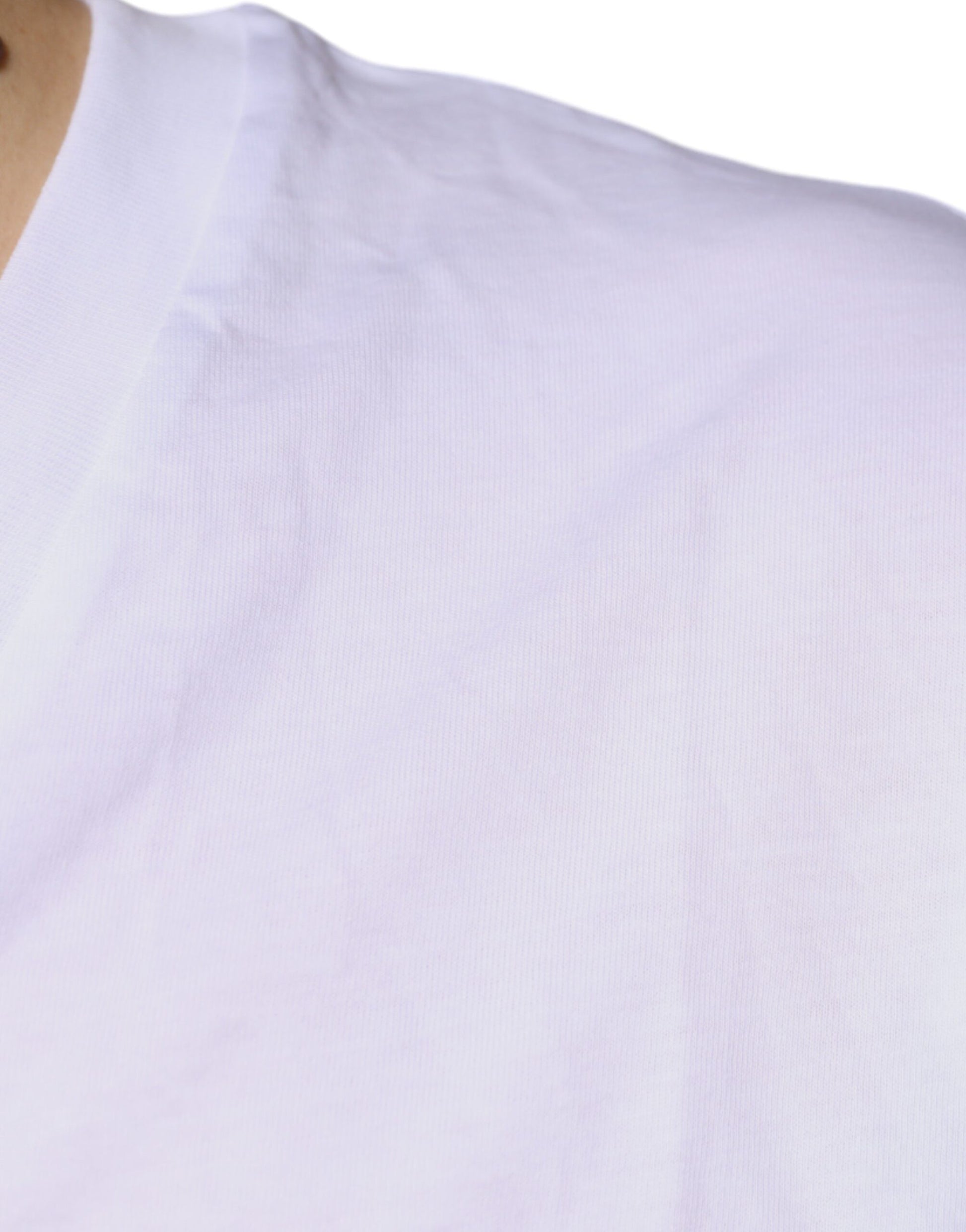 A plain white t-shirt on a person's torso