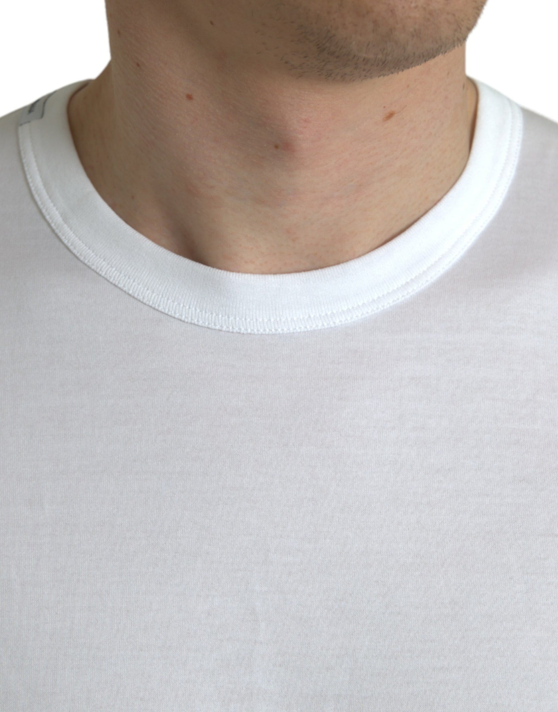 White t-shirt on man's neck