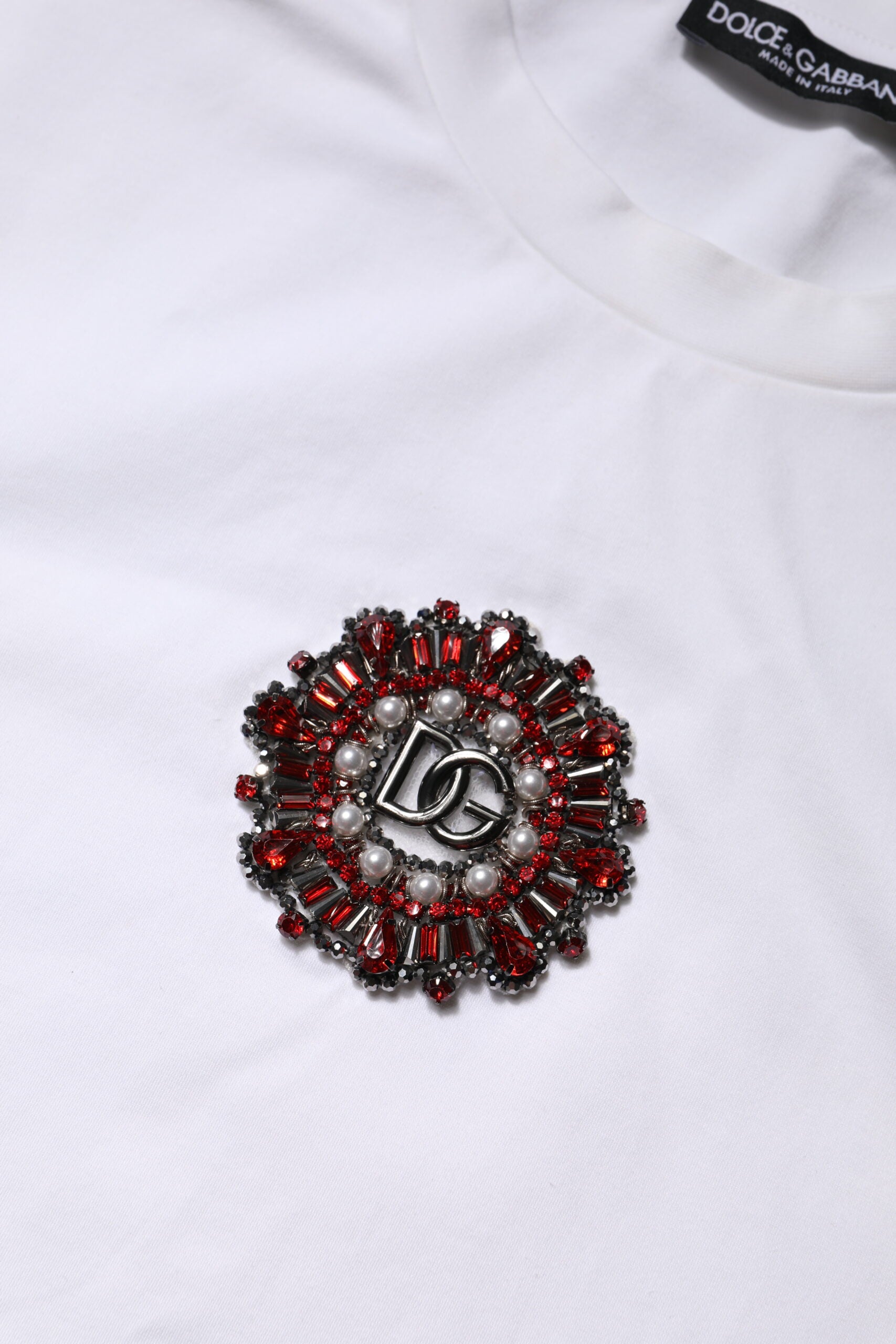 White t-shirt with red embroidered flower