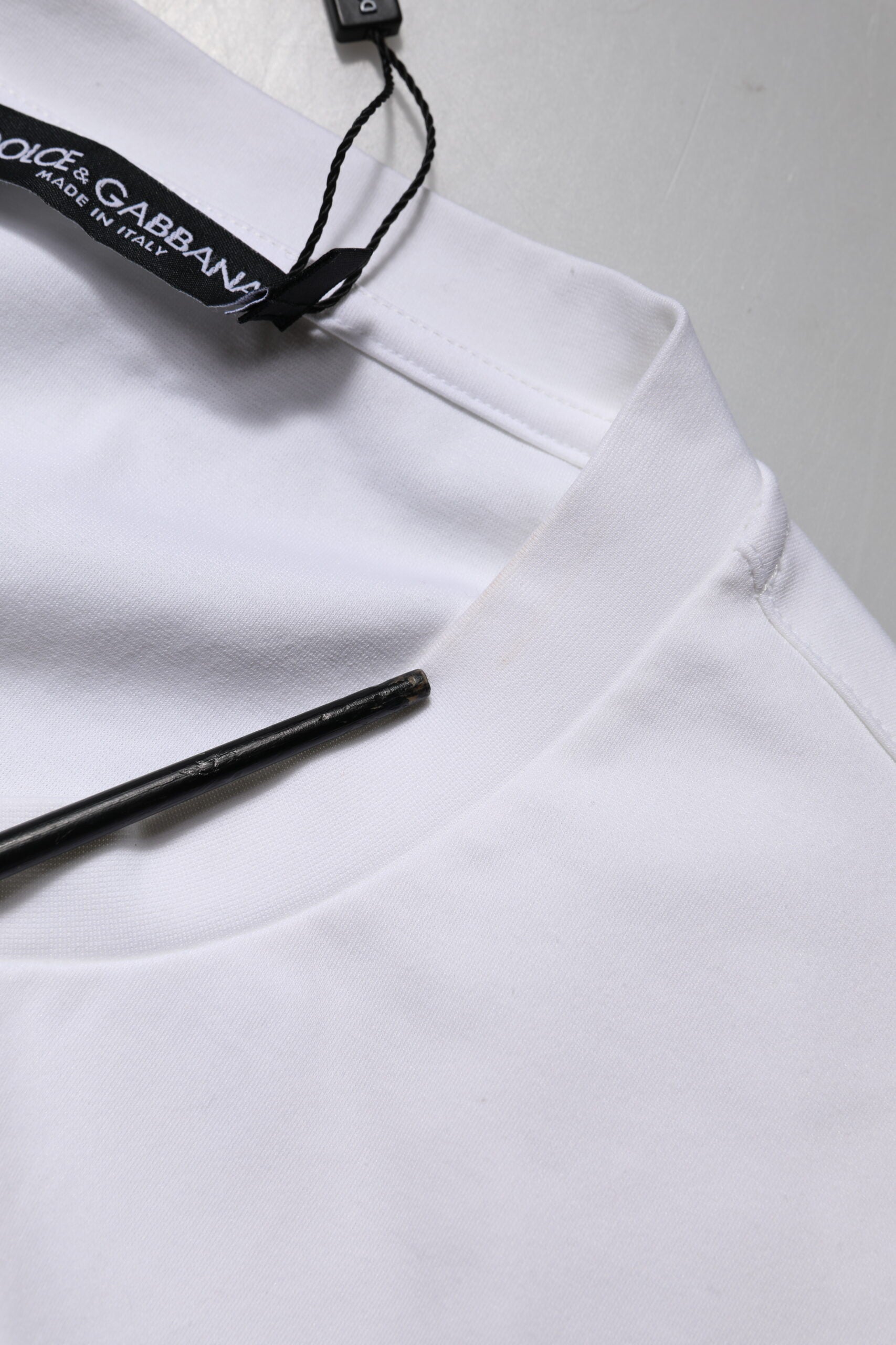 White t-shirt on hanger