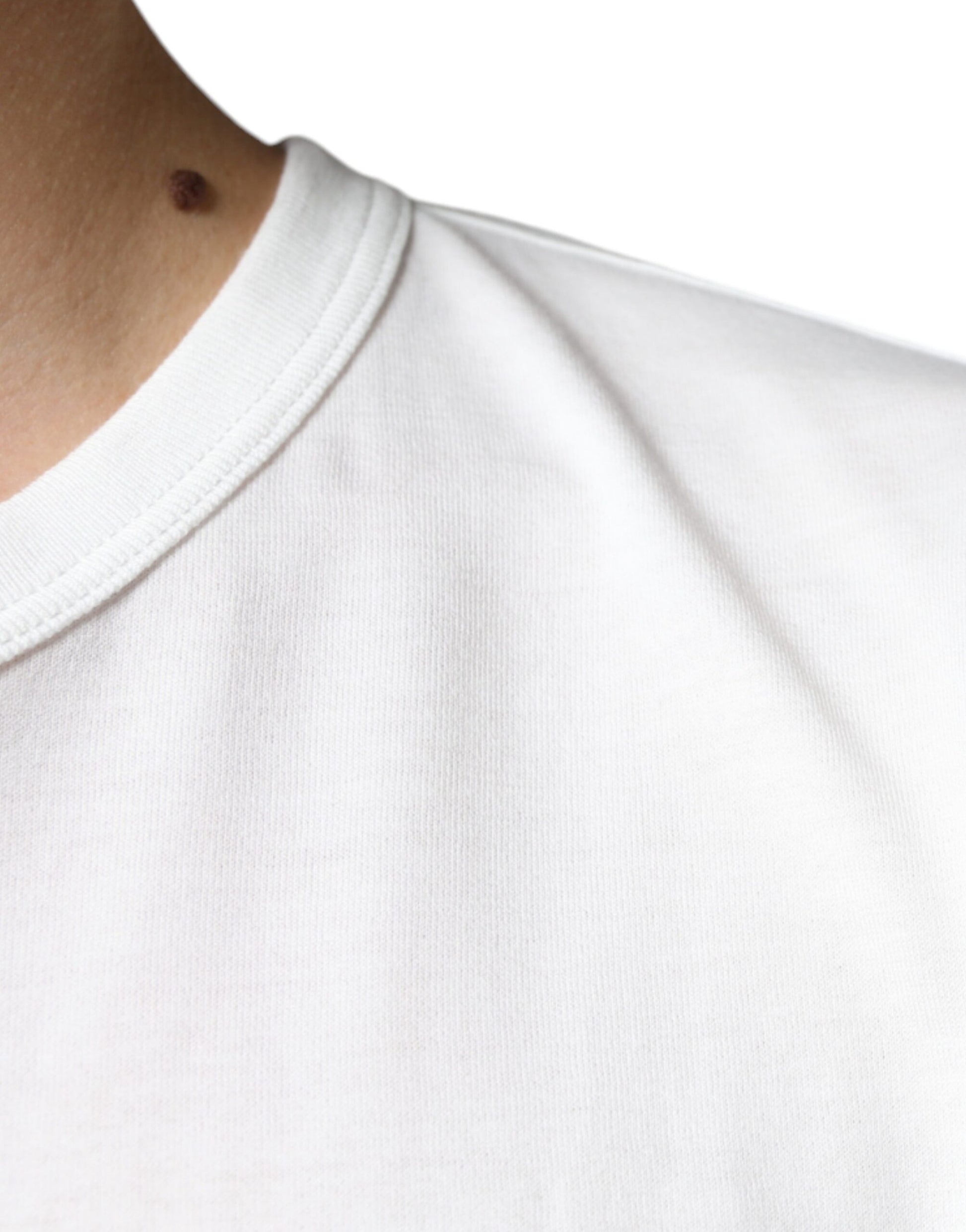 White t-shirt on man's neck