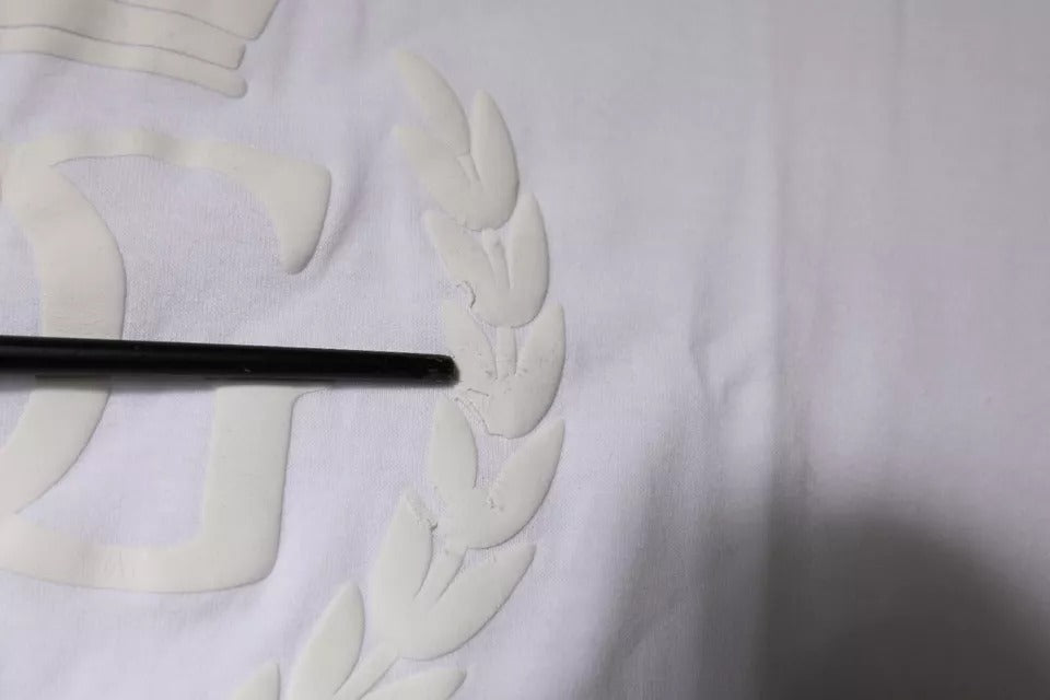 White cloth with embroidered emblems