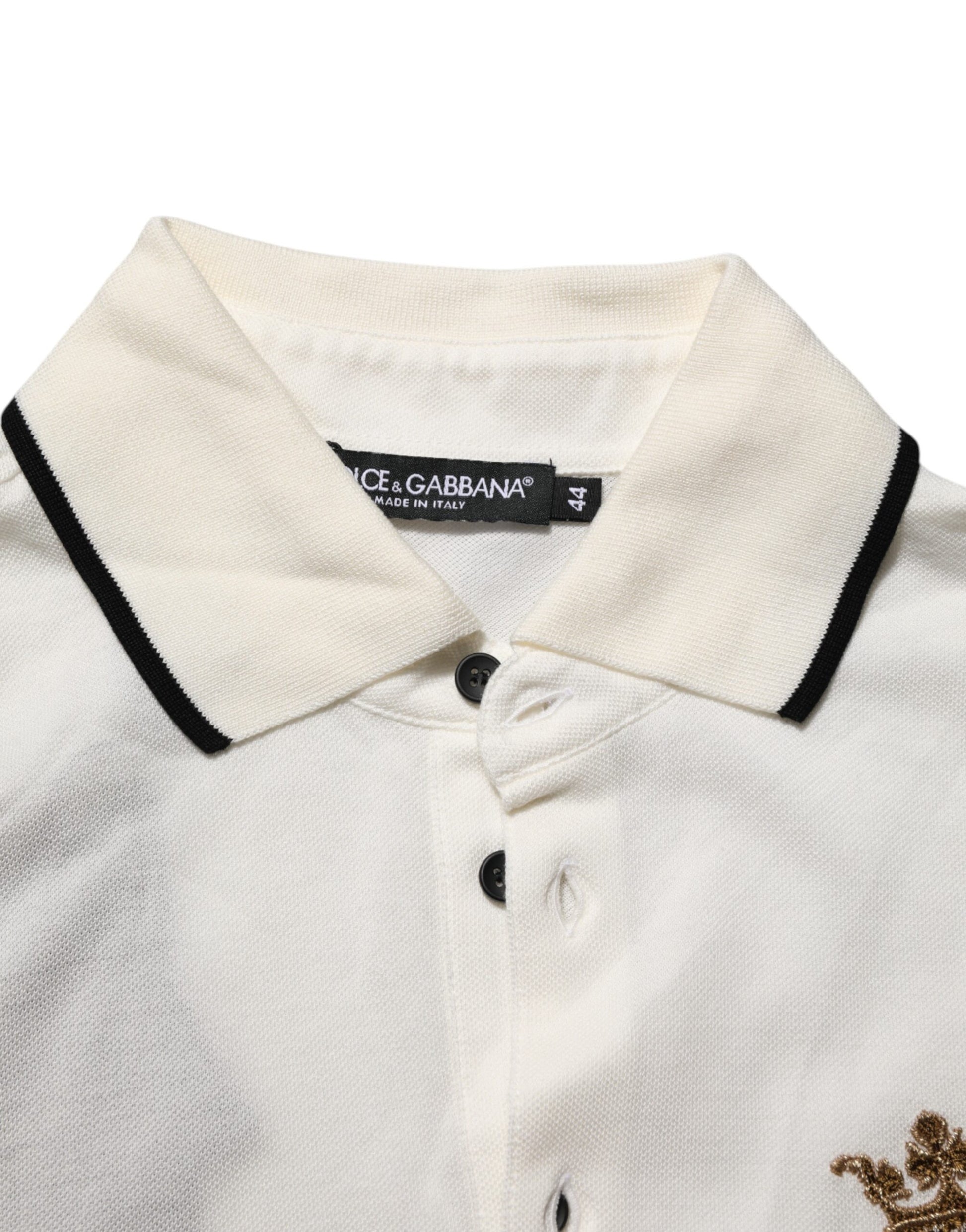 White polo shirt with black collar and buttons