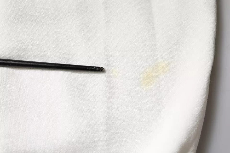 Black pen on white towel